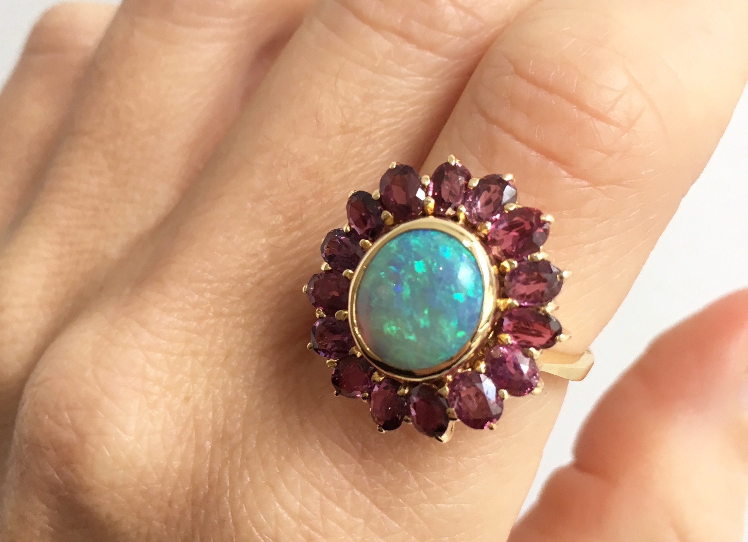 Black-Fiery-Australian-Opal-Ballerina-Ring-gold-rubies-flower-shaped Buffalo Jeweler