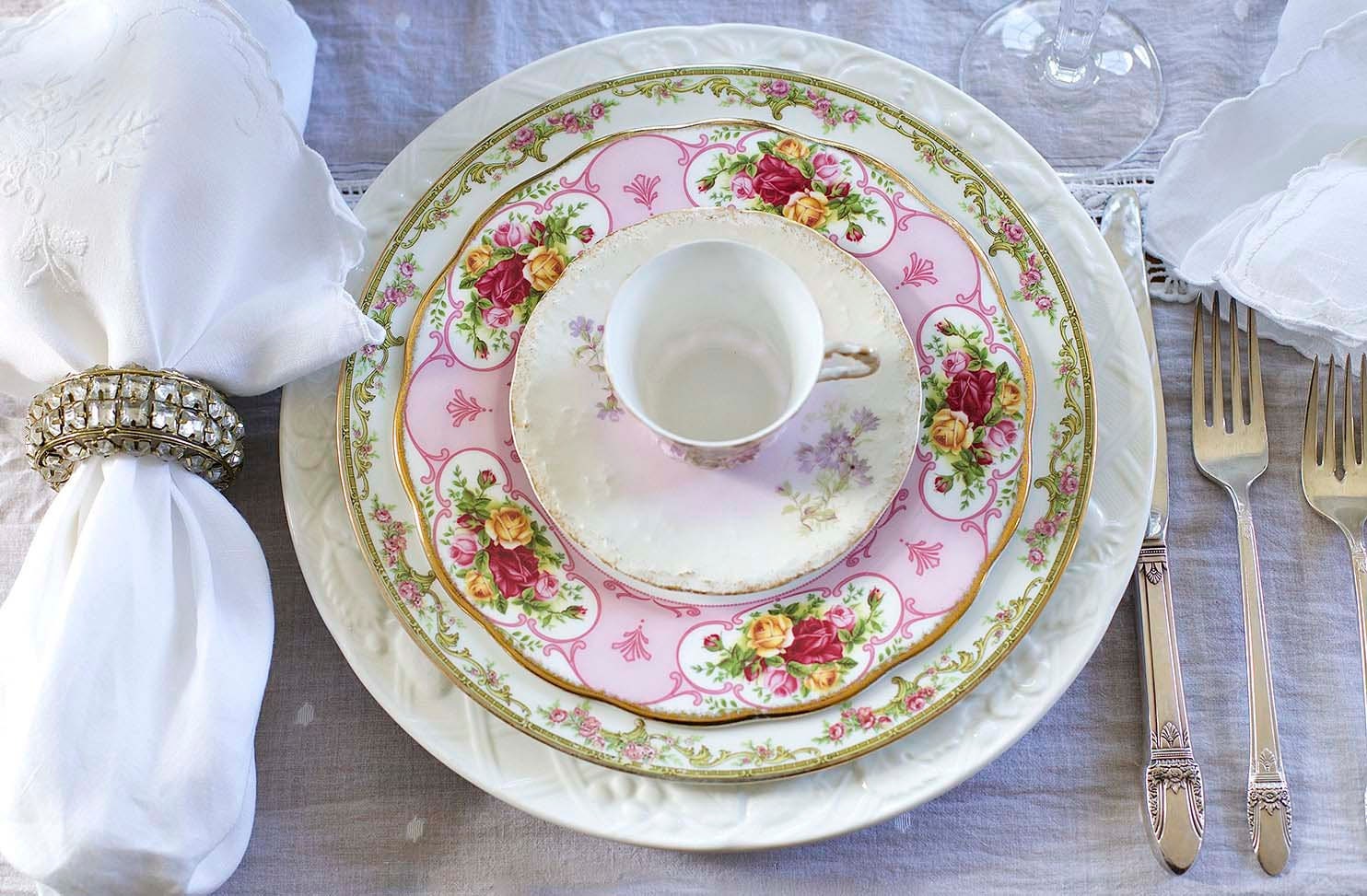 A beautiful and summery tablescape with mismatching china.