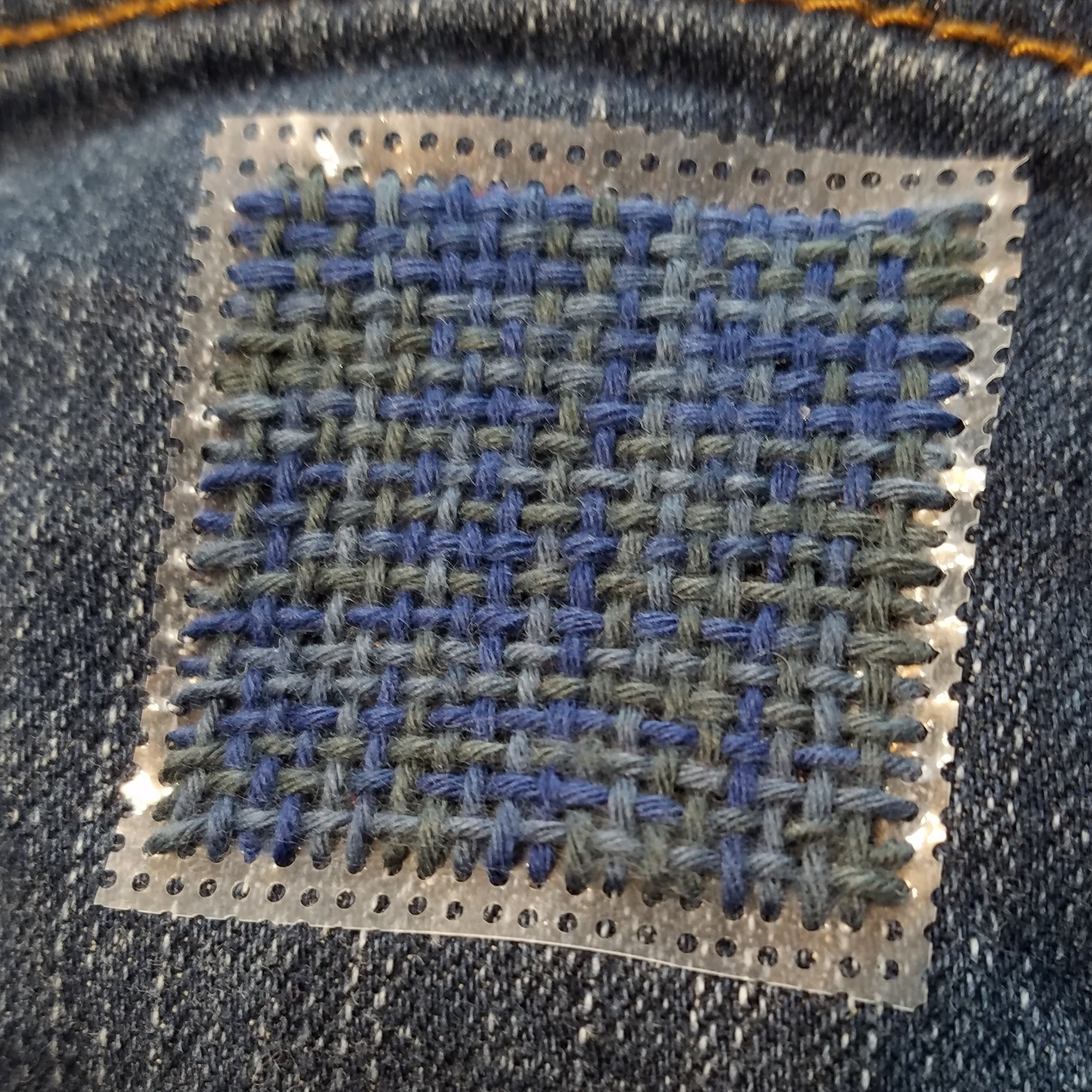 woven patch over denim