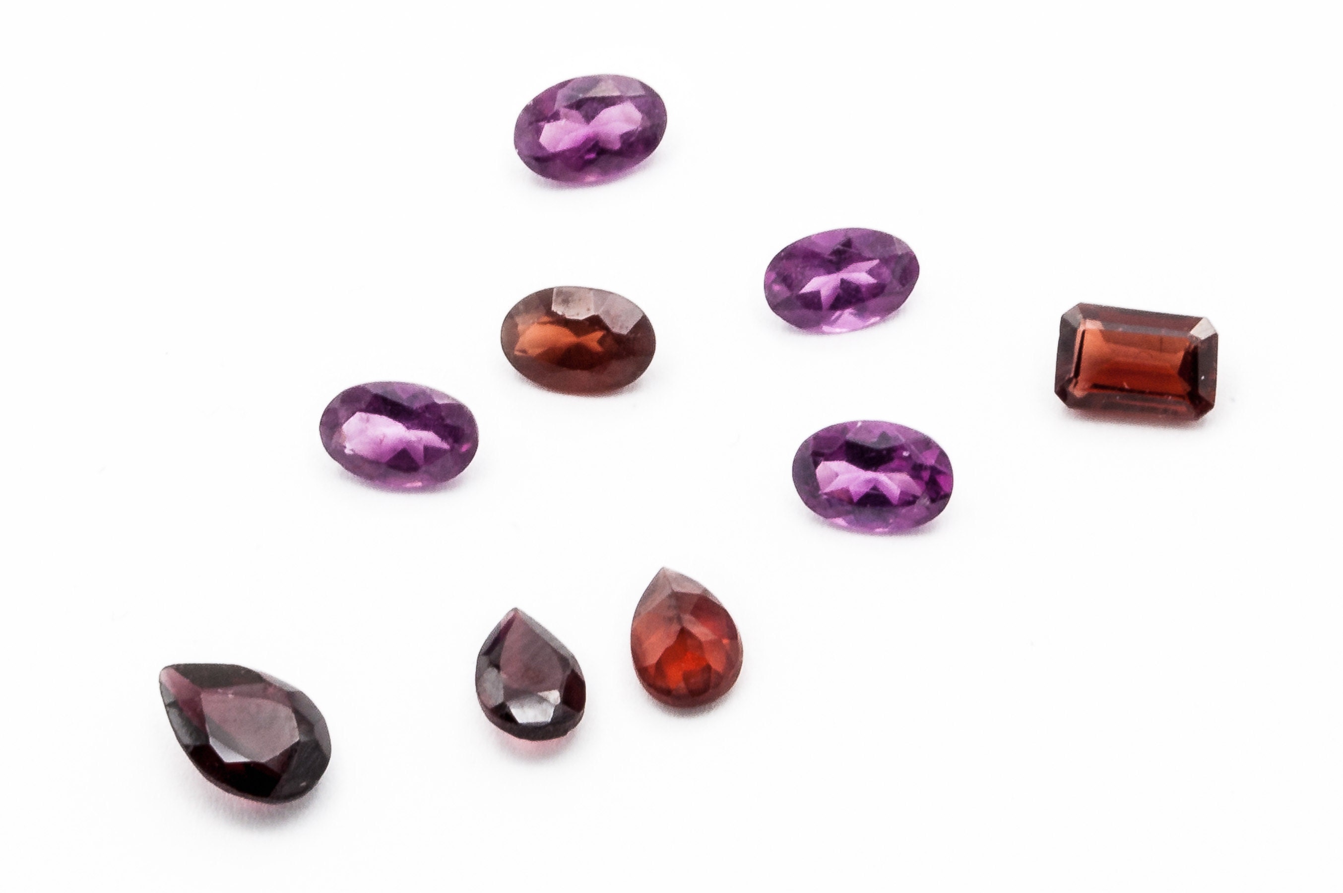 Loose  Pear Emerald and Oval Cut Garnets in Color Variety Violet Cherry Red bright Red Dark Red