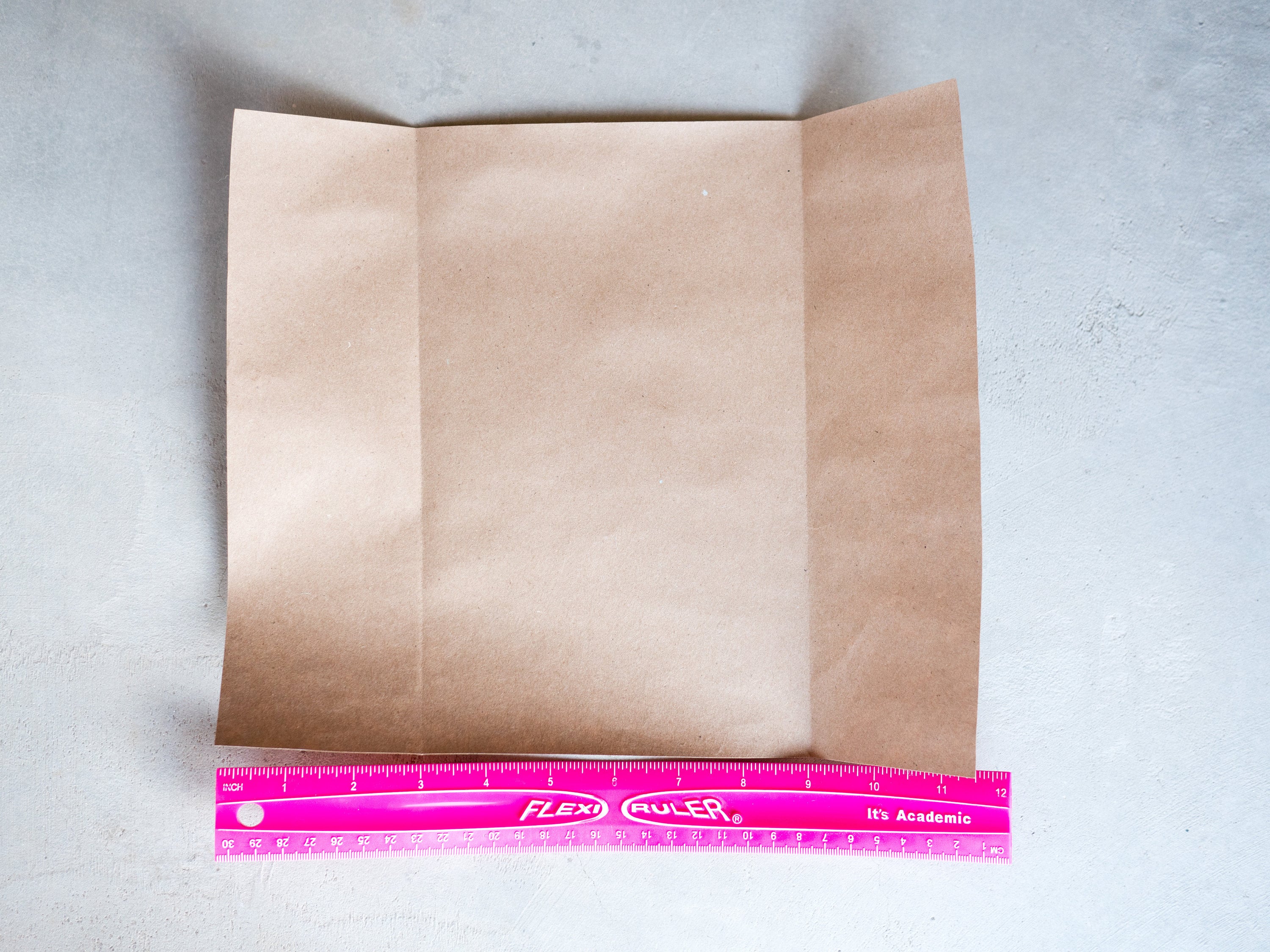 Measure 3 inches from each end and fold toward the center