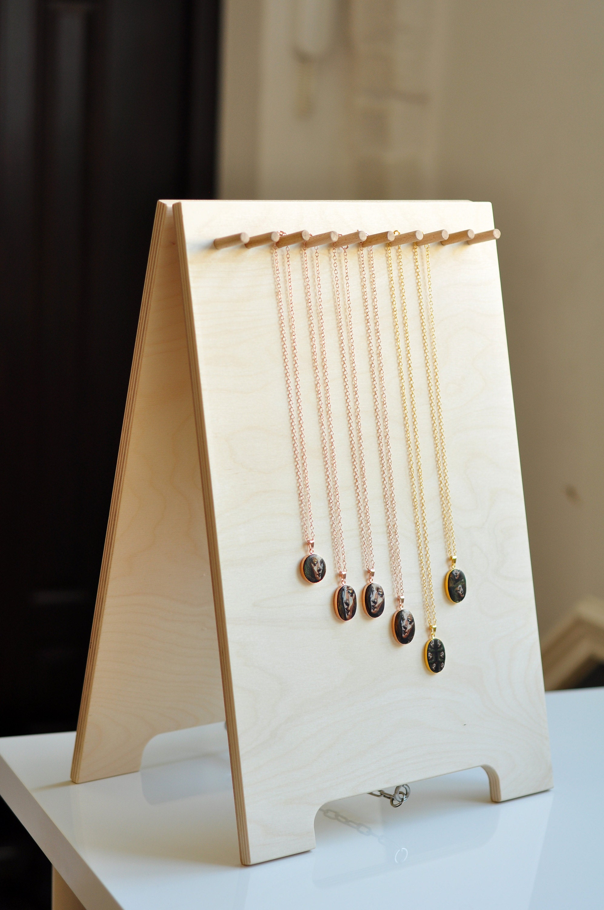 Nacklace stand with @sacra_argilla necklaces