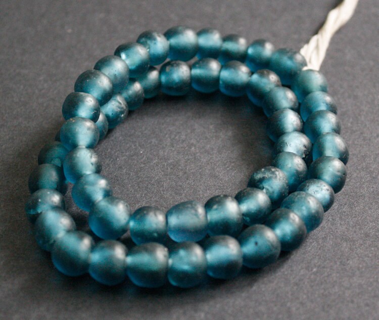 packet translucent beads whose colour is derived from imported glass beads