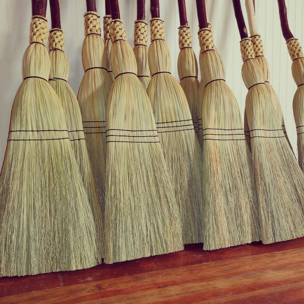 Woven brooms functional and aesthetic tools