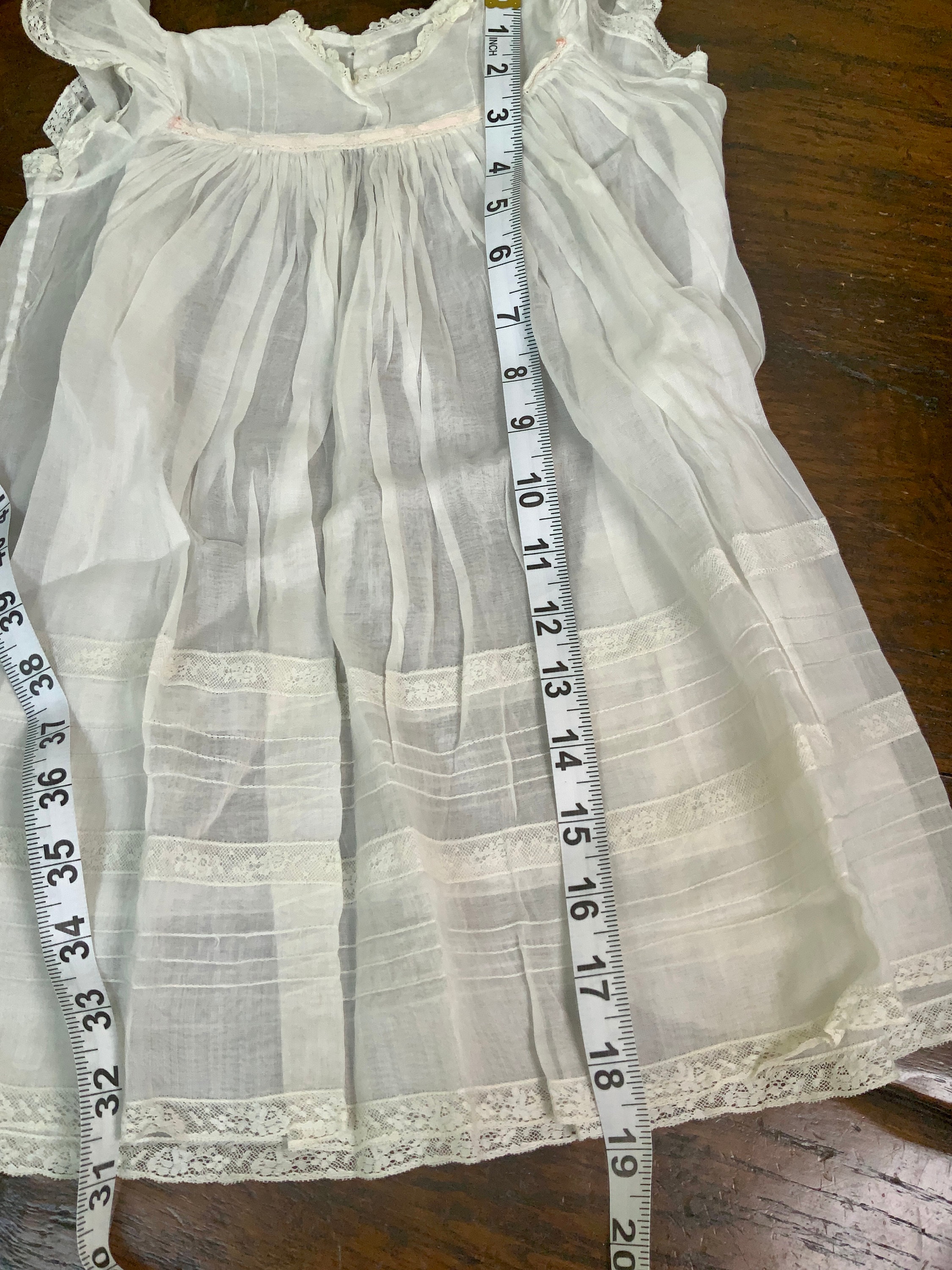 Measuring for the length of the dress