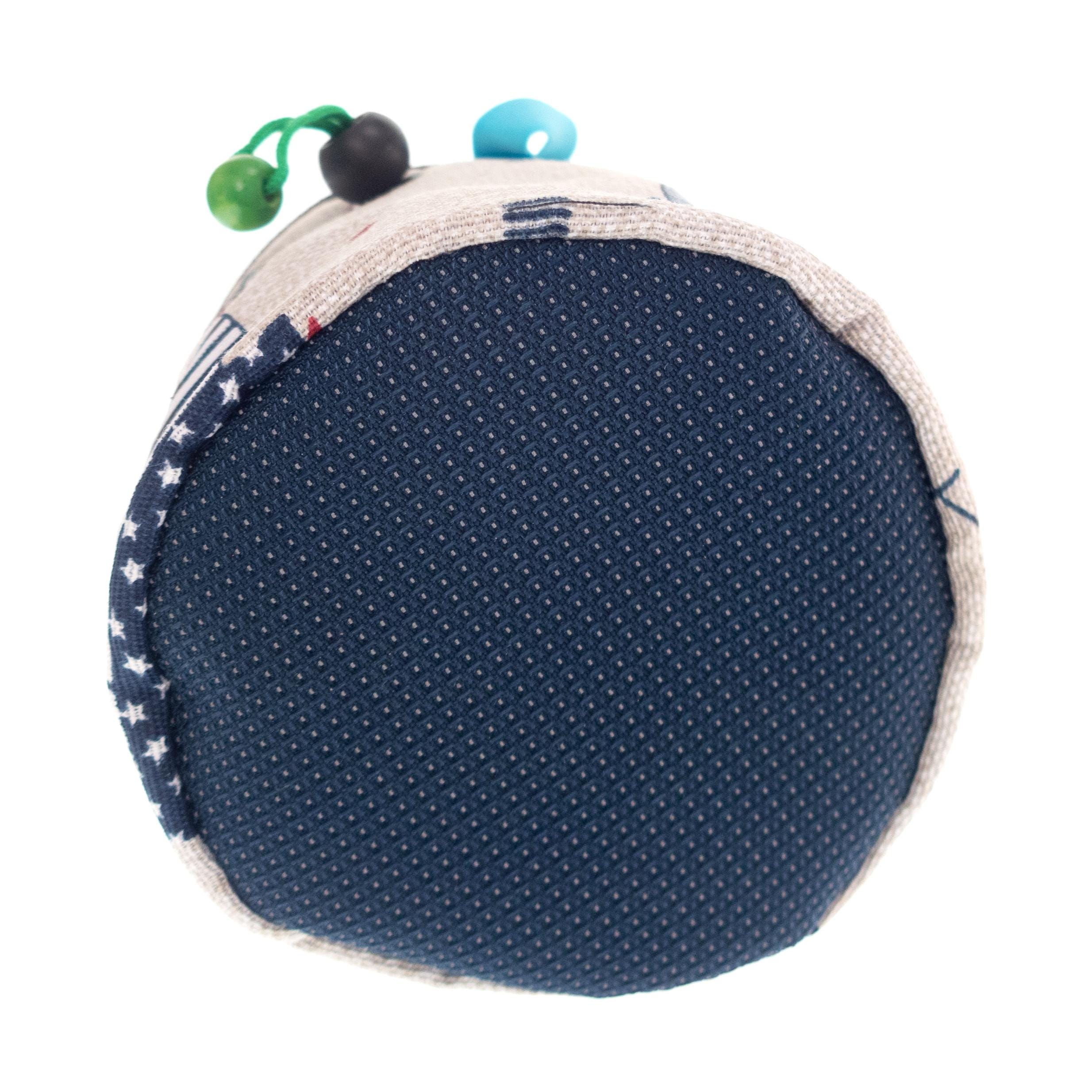 Stylish S-size chalk pouch with colorful animal pattern, ideal for young climbers practicing on climbing walls.