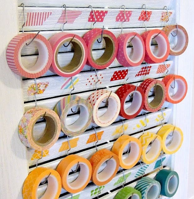 washi tape hung on paperclips from shutters