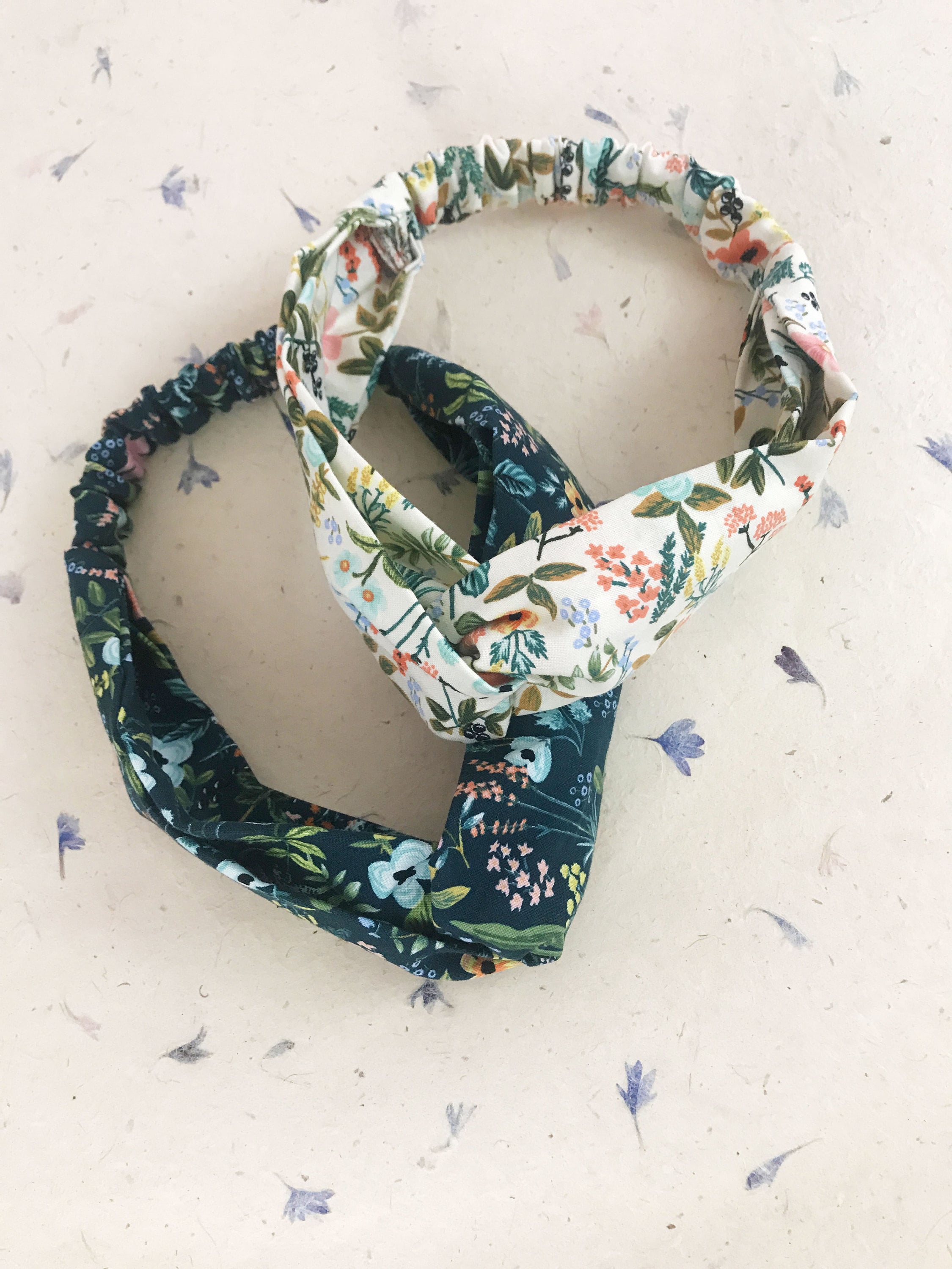 Navy blue and cream floral twisted headbands.