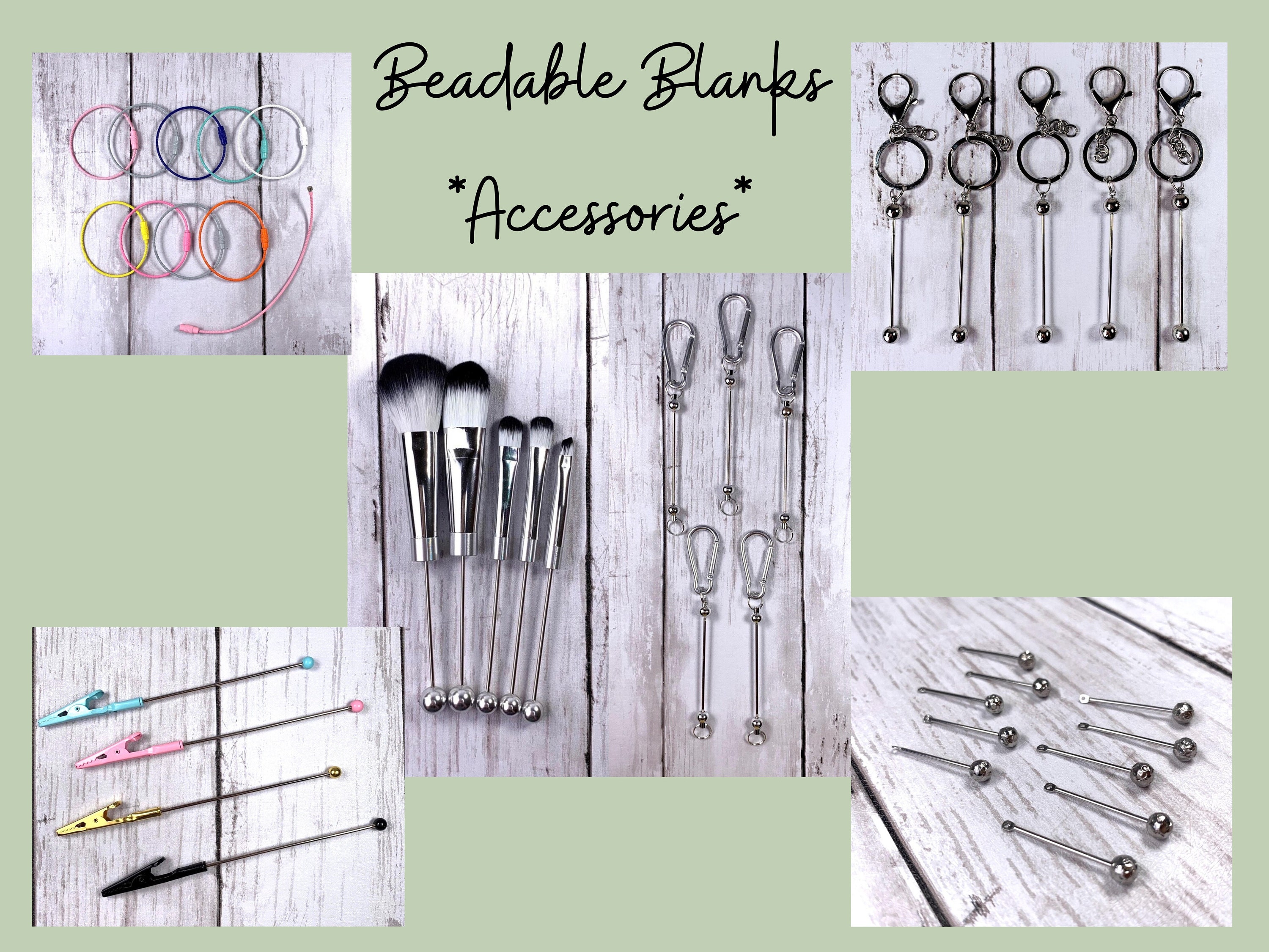 Collage of beadable blanks for accessories on a light green background. Includes colorful bracelet wires, makeup brushes, keychain blanks, bag charm blanks, and pendant blanks displayed on rustic wooden surfaces, with the title Beadable Blanks Accessories in a decorative font