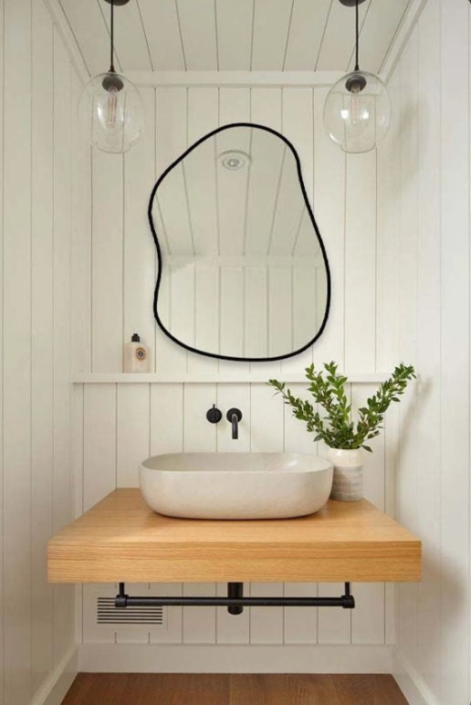 Asymmetrical Mirror