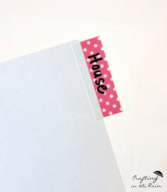 A close up of a folder with decorated tab