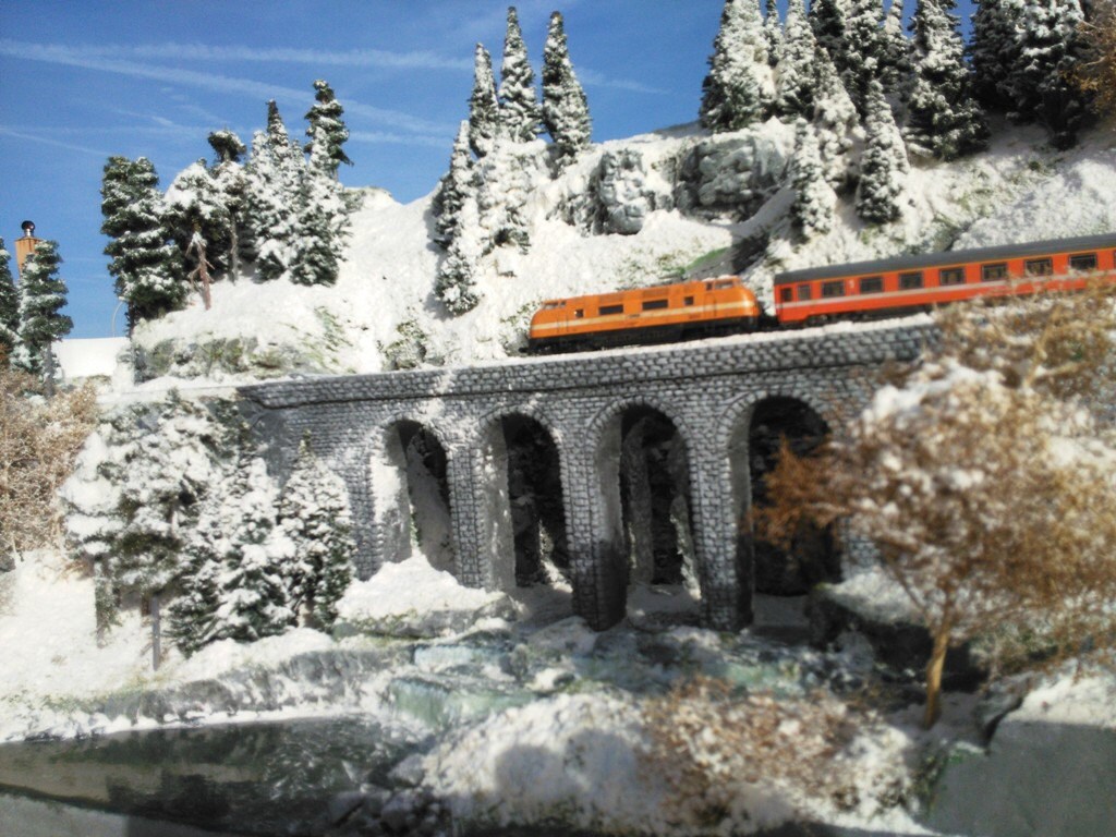 A model railway layout with hand made by me of an arch stone brdge some years ago