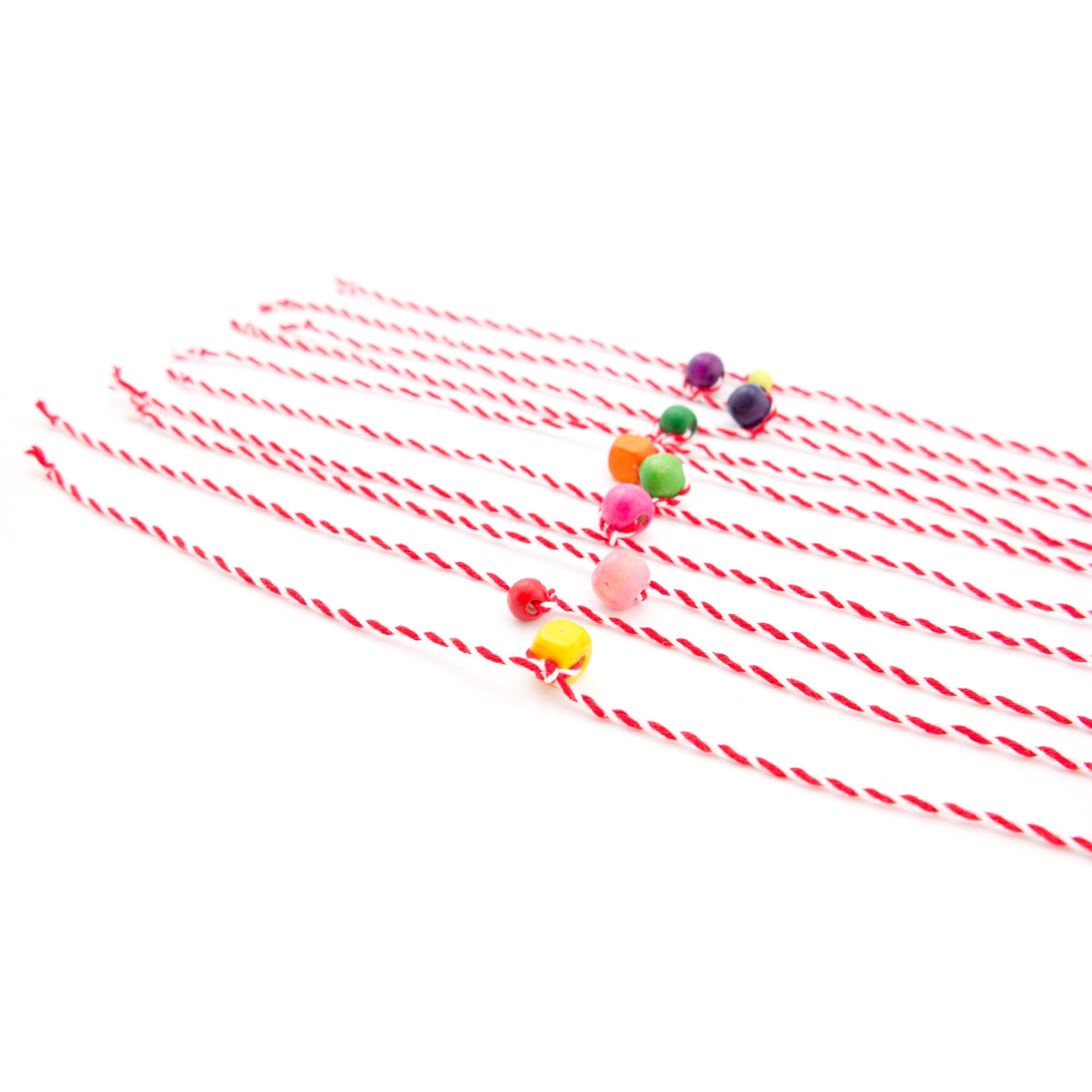 Traditional Bulgarian Martenitsa bracelets in red and white twisted cotton with wooden beads Nadamlada design