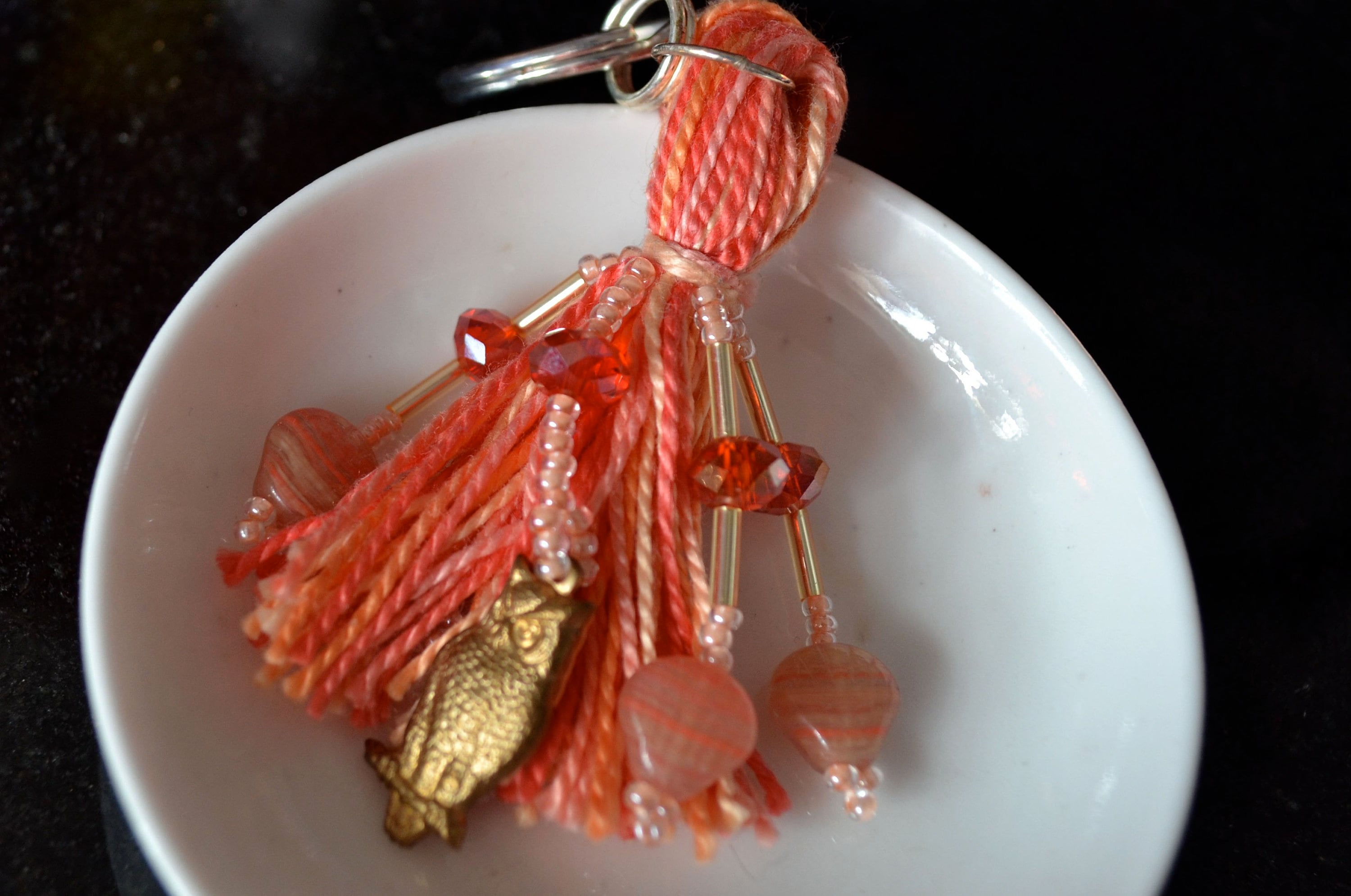 Brass owls on pink beaded tassel keyring