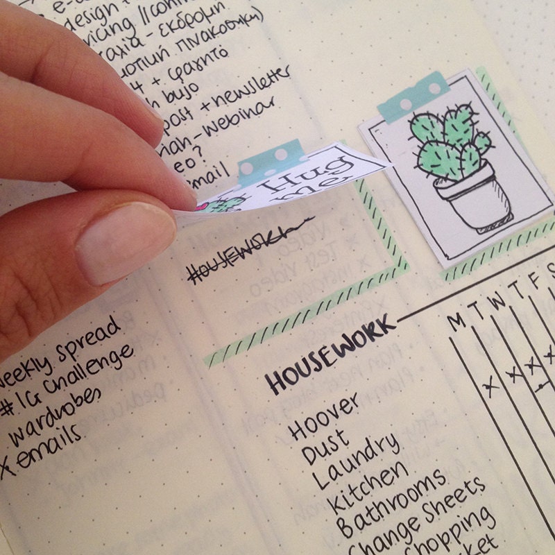 close up of bullet journal page where washi tape helped cover a mistake