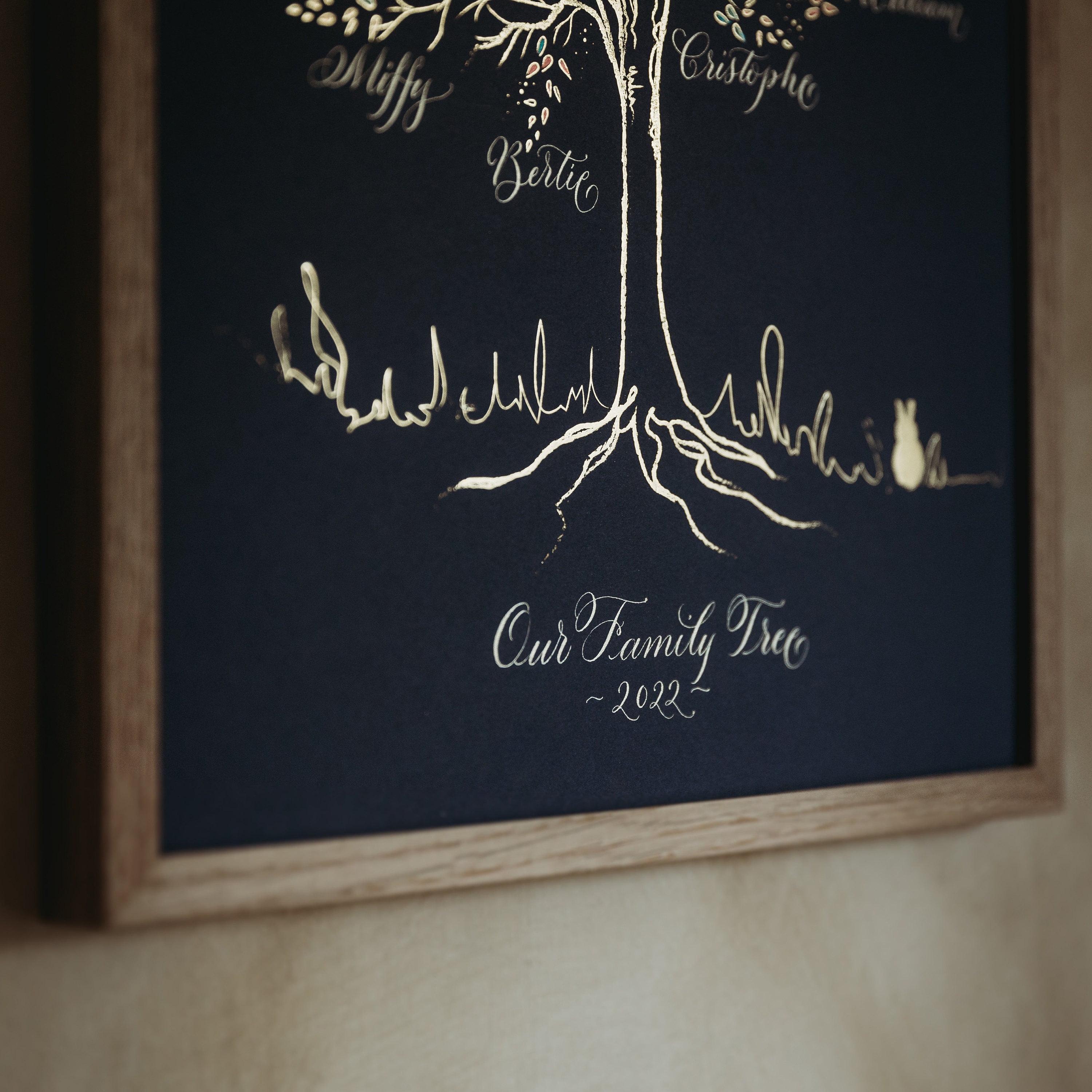 Detail of our family tree where the tree illustration is stamped onto the luxury paper and finished in hand calligraphy. Image ©Thyme Lane Photography