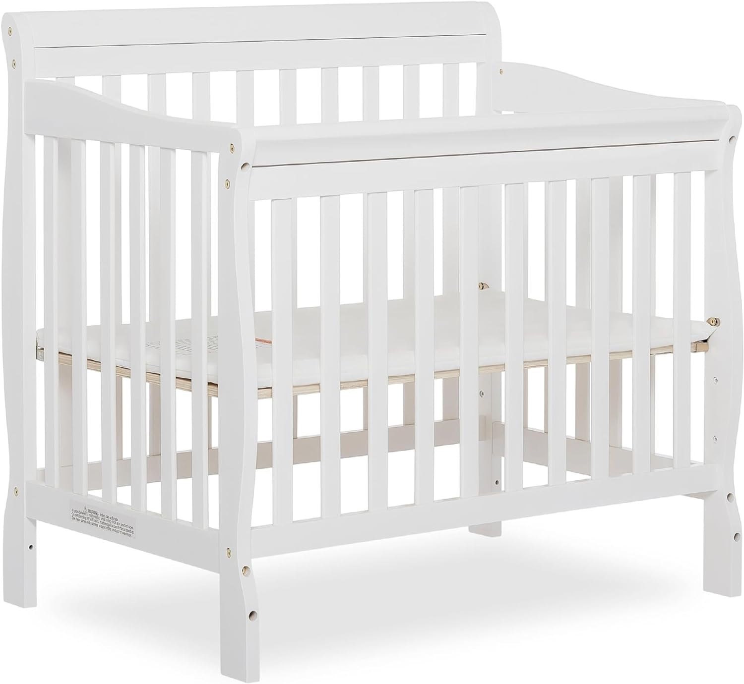 Aden 4-in-1 Convertible Mini Crib In White, Greenguard Gold Certified, Non-Toxic Finish, New Zealand Pinewood, With 3 Mattress Height Settings