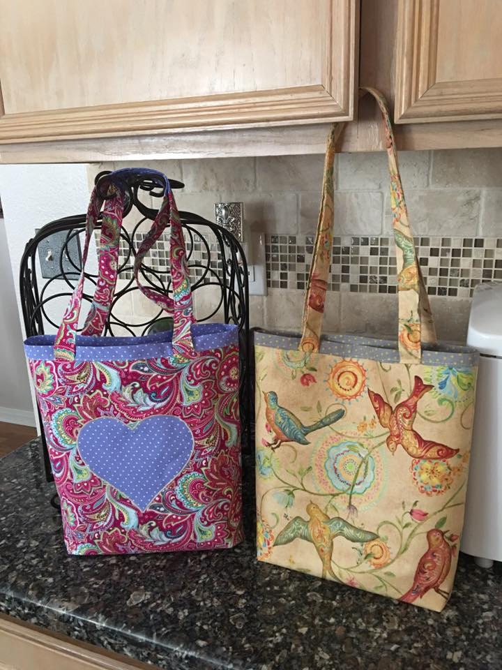 Simple tote bags with constrasting fabric applique.