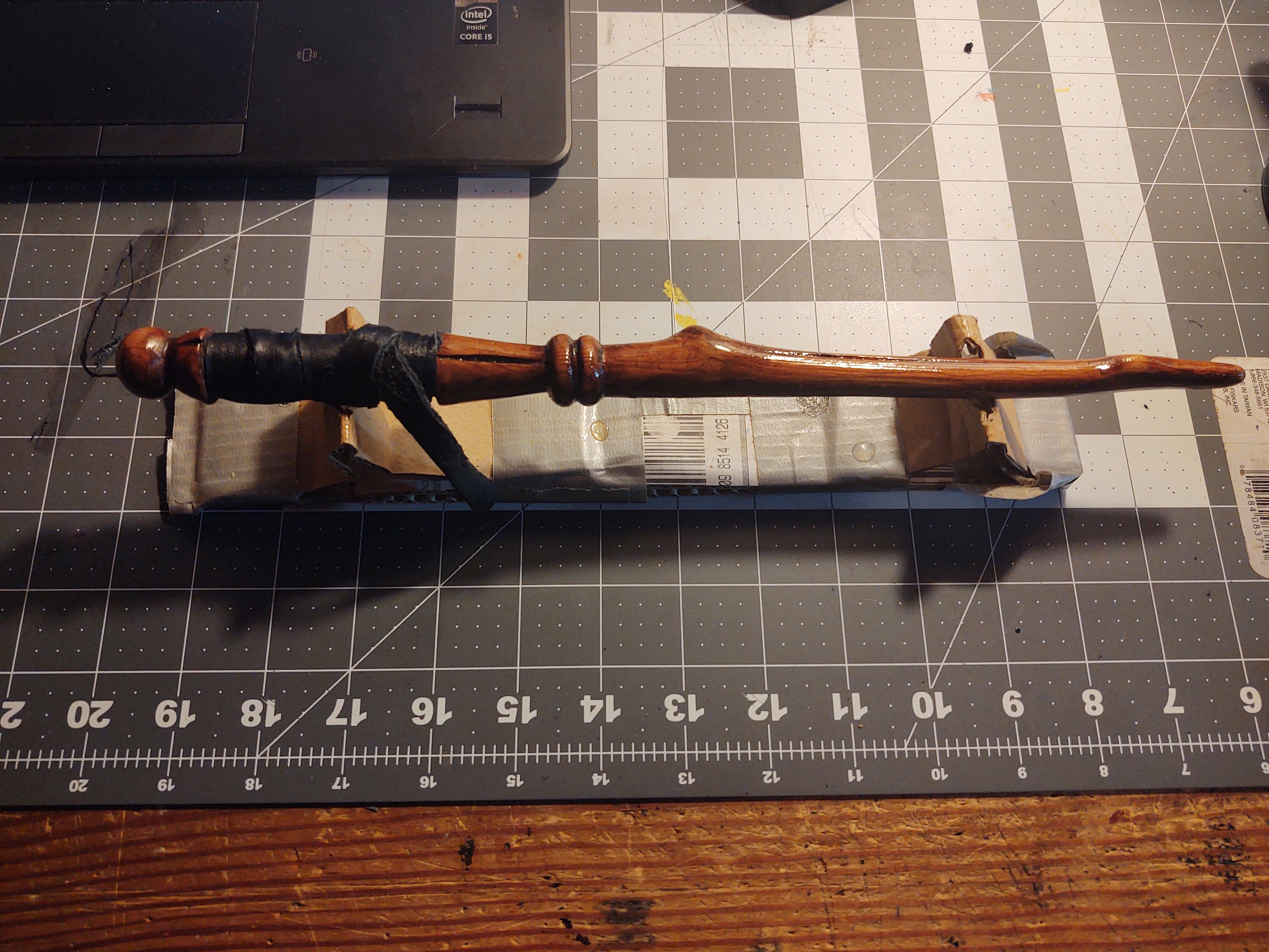 fully stained, sealed, and leather handle wrap added.