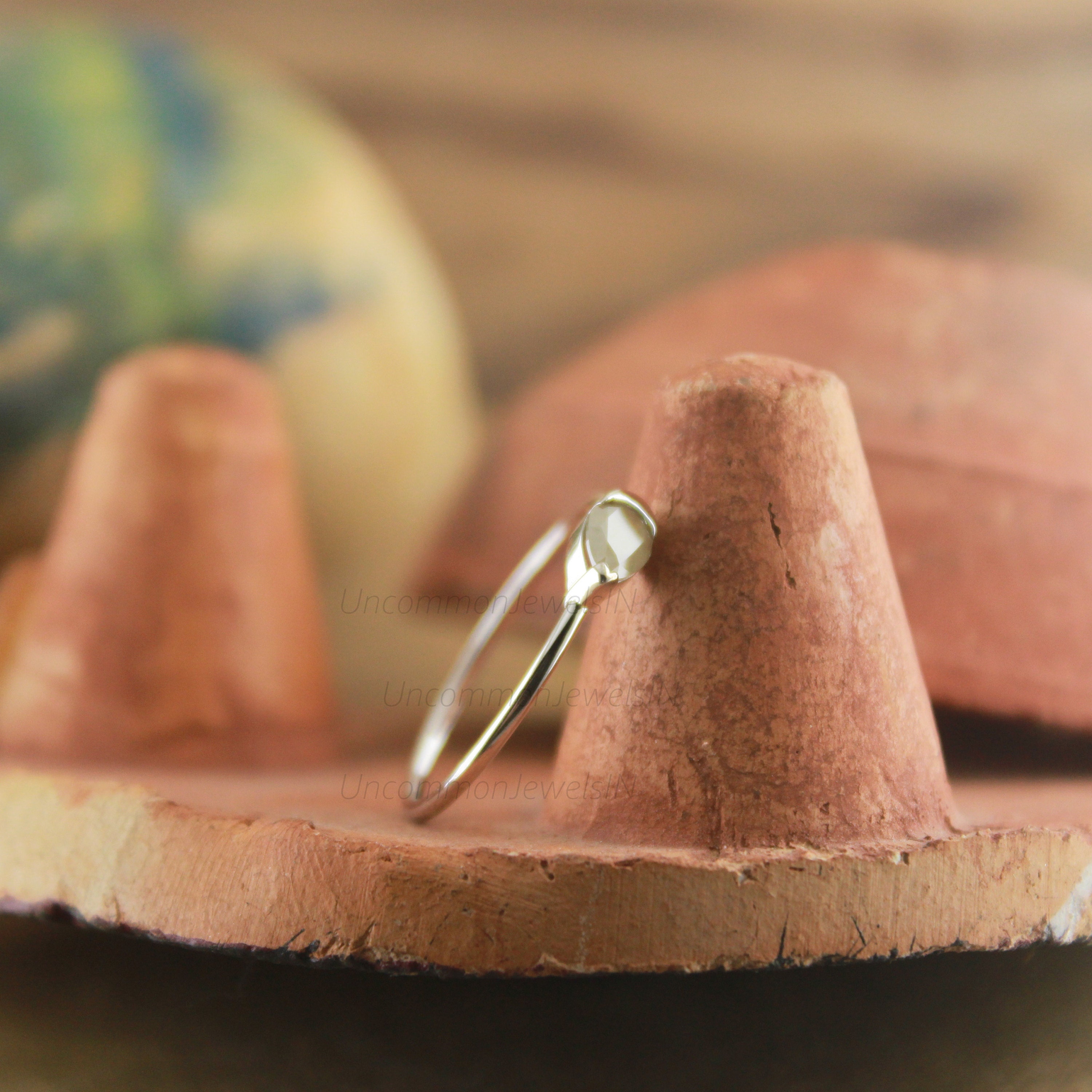 east west pear diamond ring, unique engagement ring