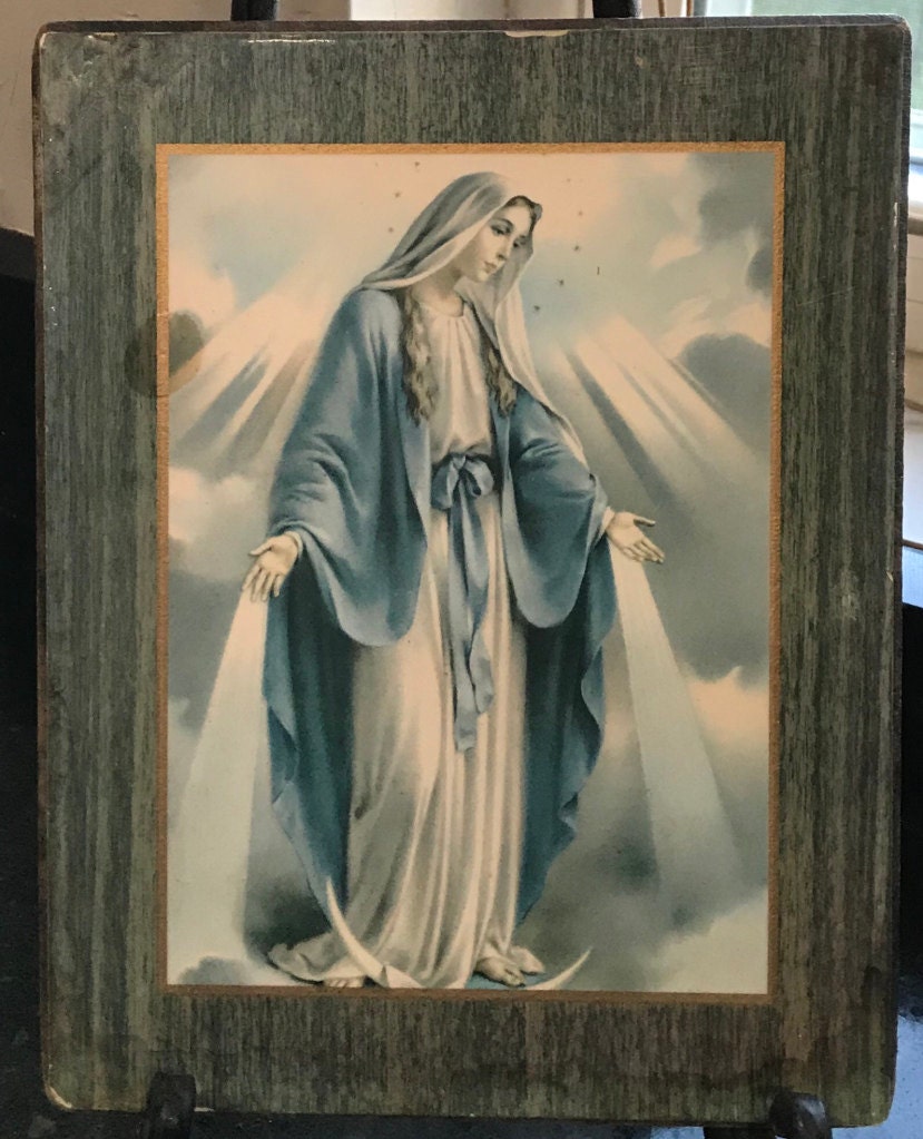 I received this plaque of Our Lady of Grace from my grandmother for my 7th birthday in 1977.