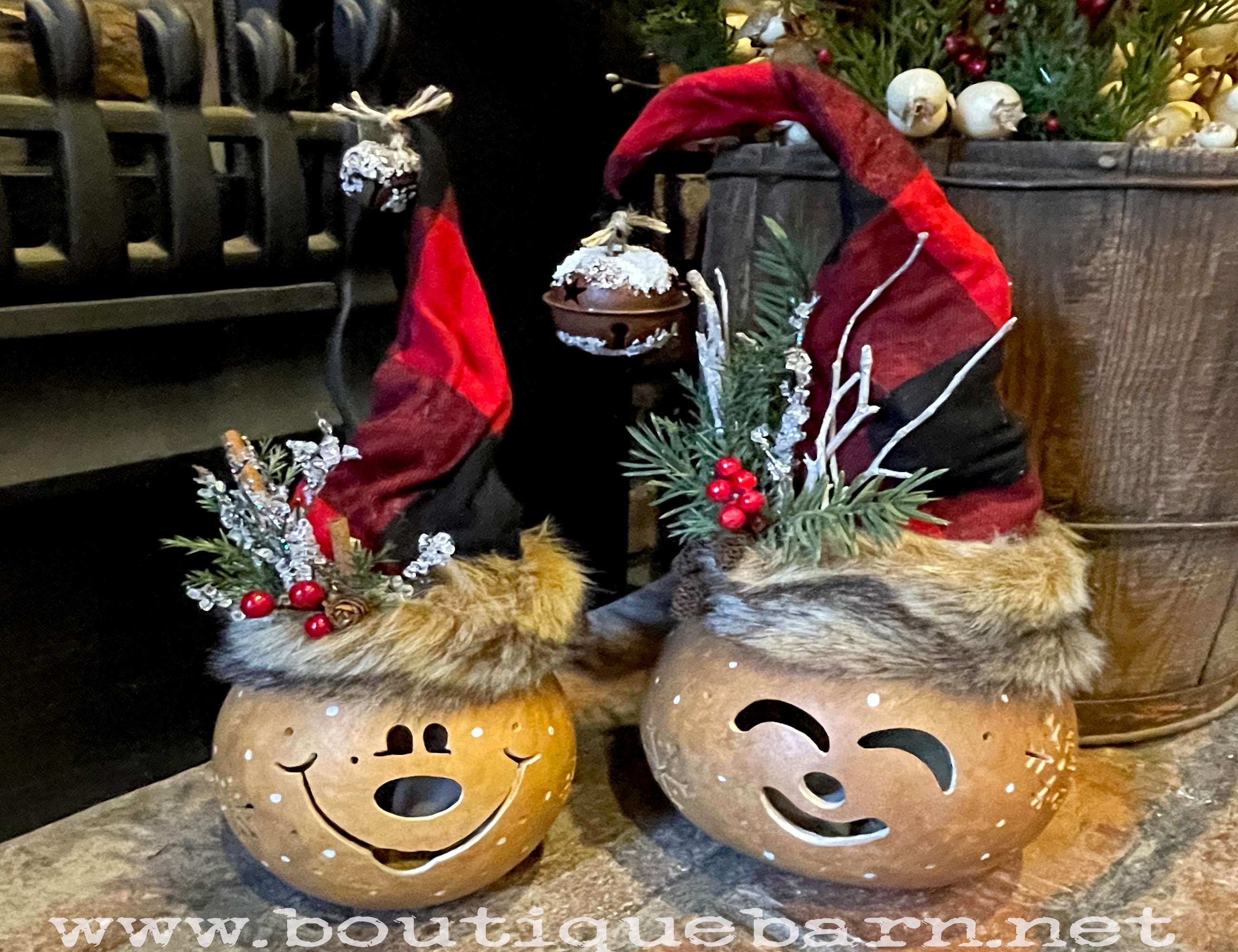 Christmas Elf decorations that are made with real dried gourds and handmade hats. A candle with timer is included to for a light up feature.