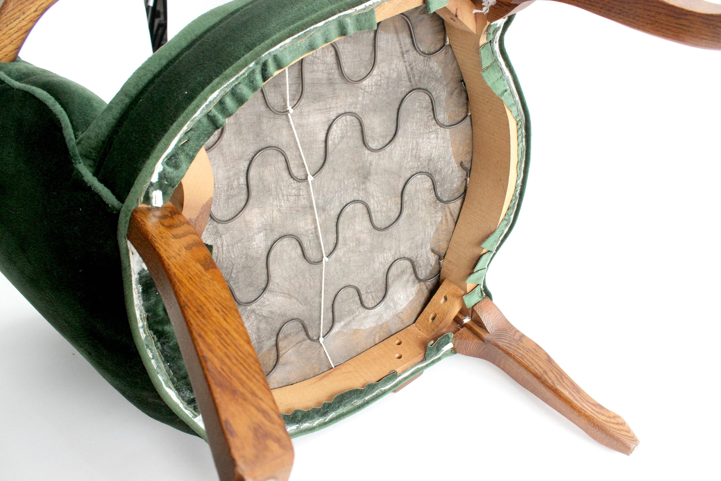 green tufted club chair