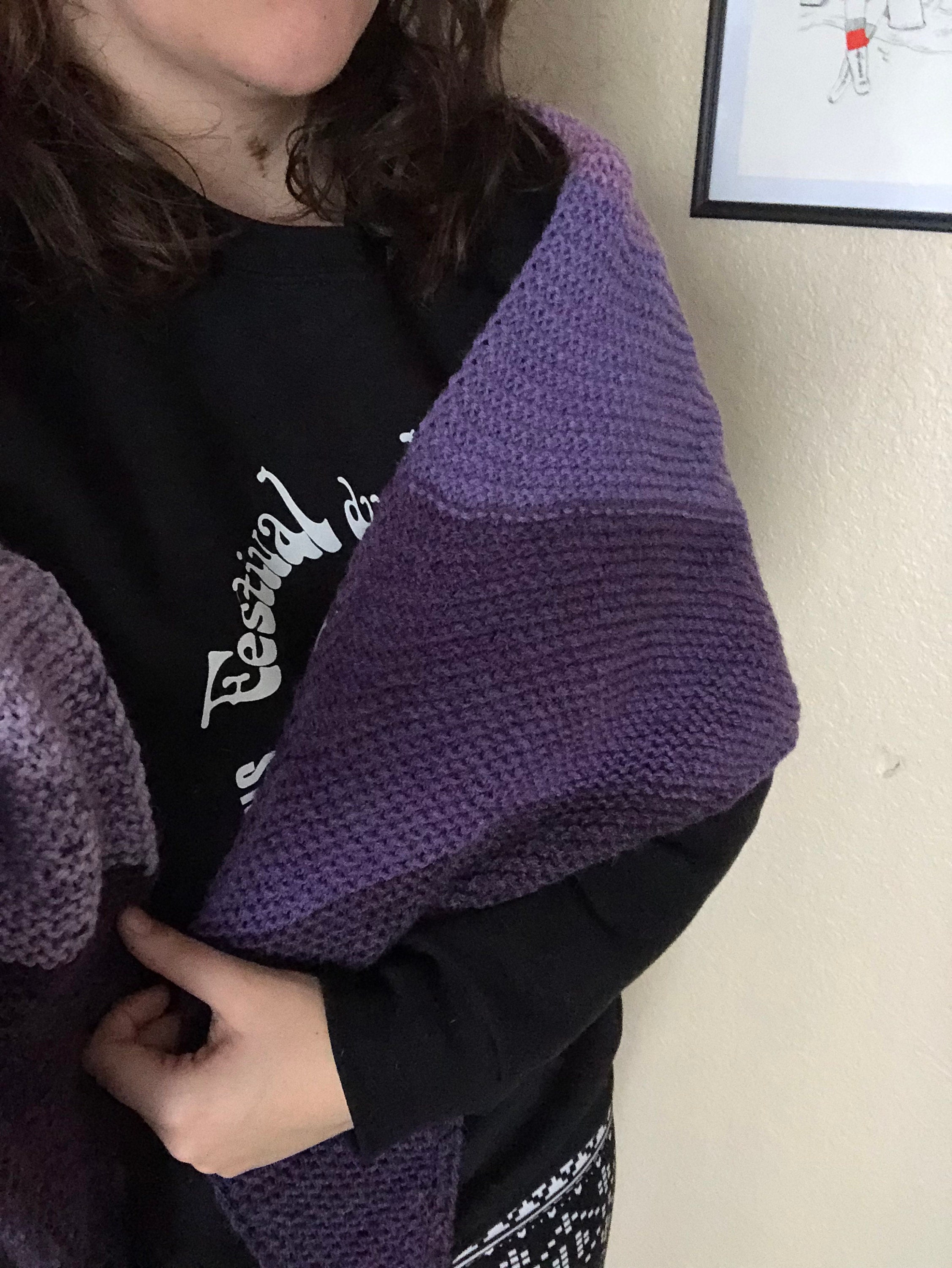 Woman wearing purple knit shawl