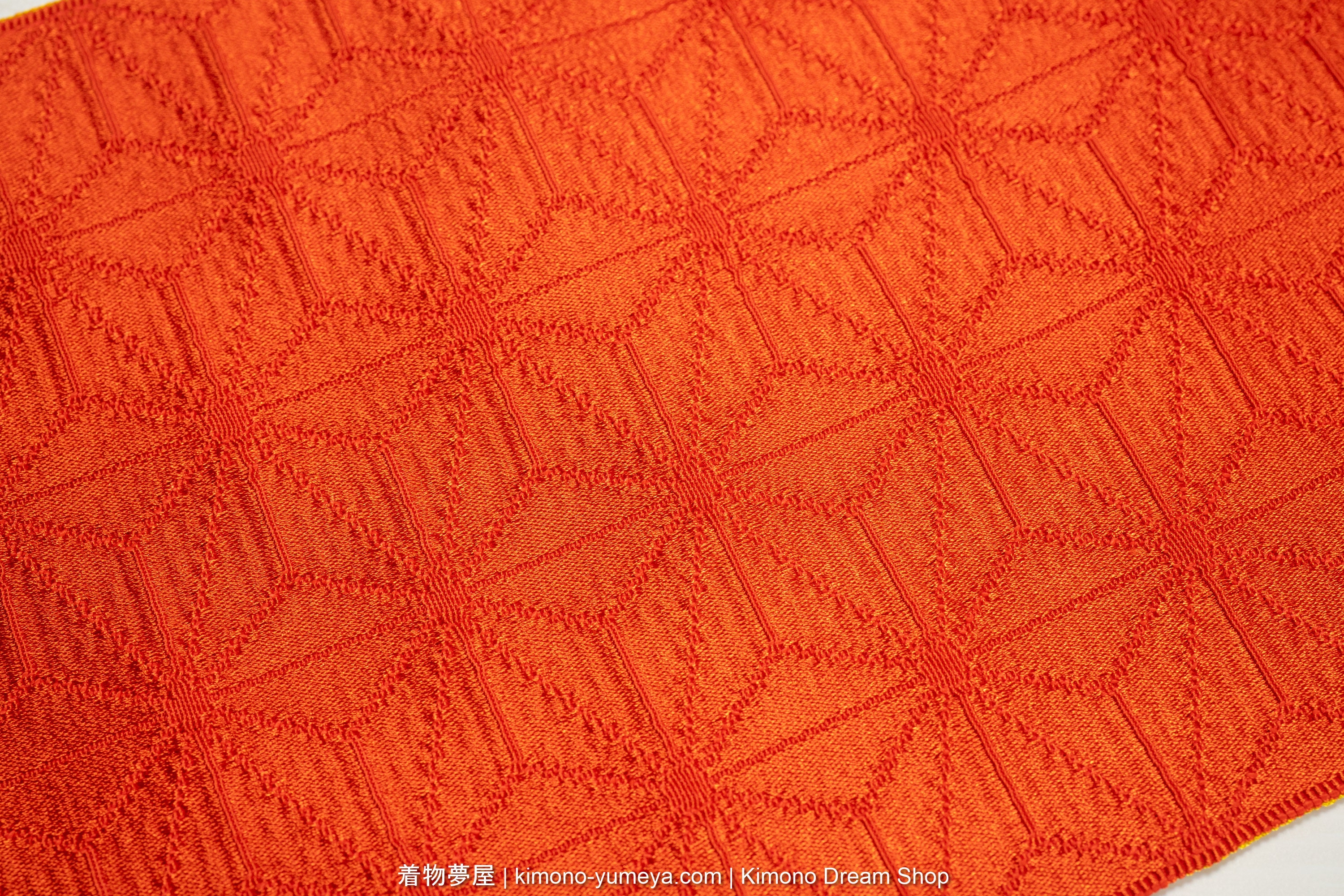 Solid color (iromuji) orange hemp leaf pattern.