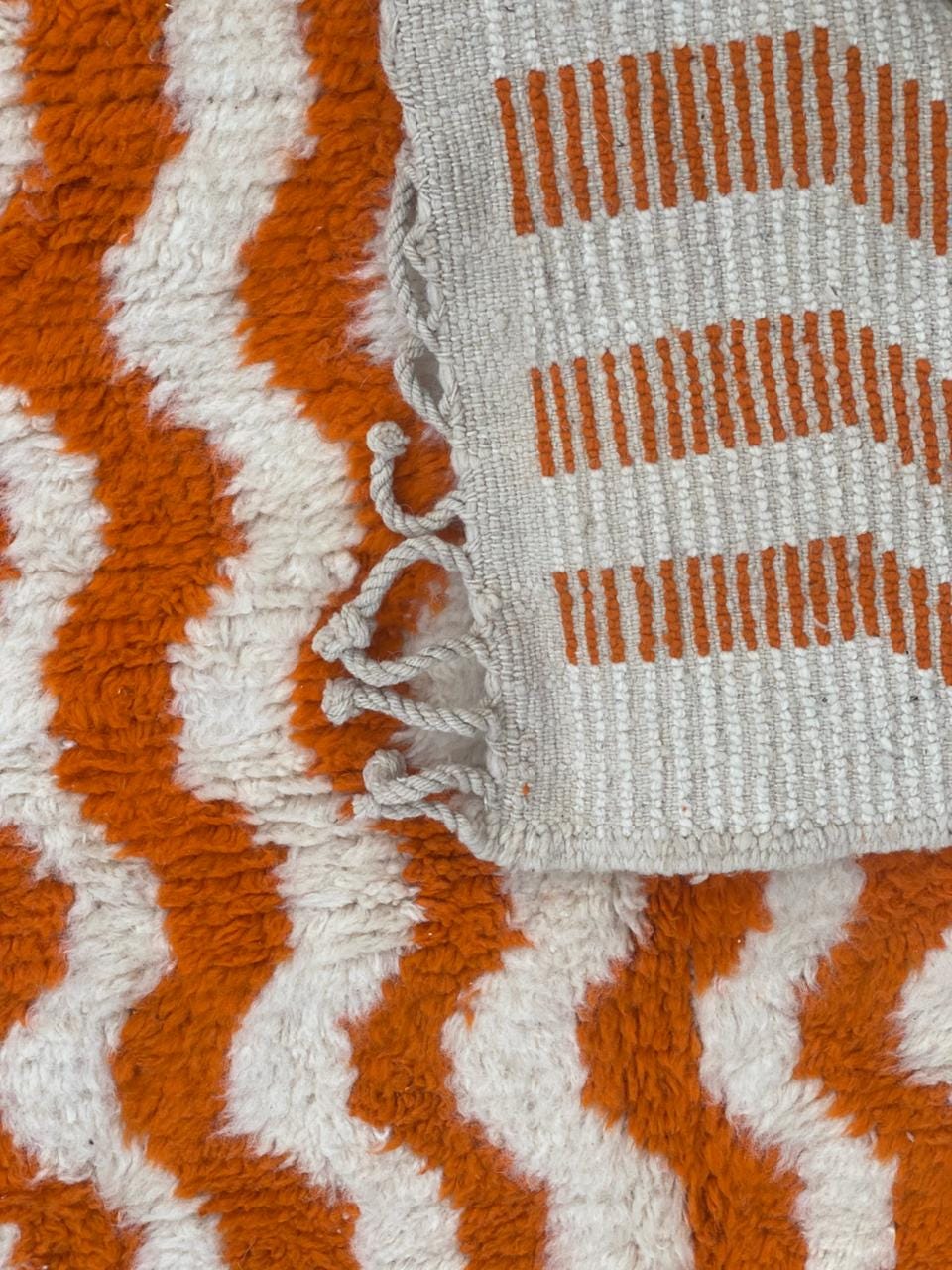 Vintage boho orange wave rug handmade wool with tassels
