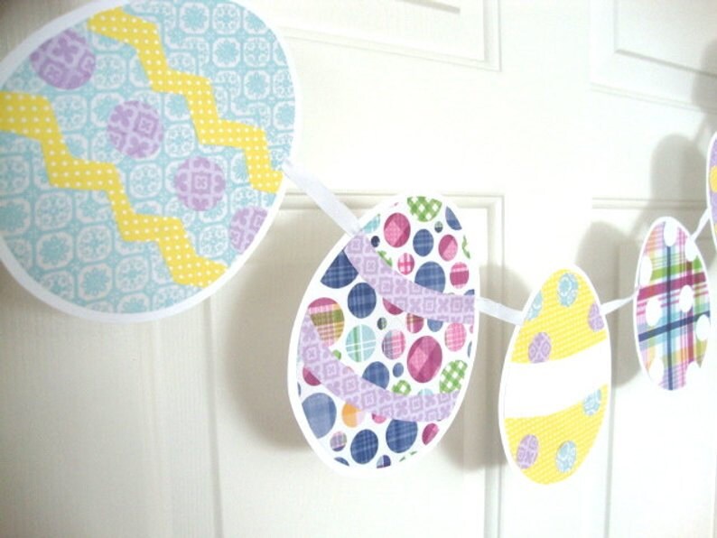 Easter Egg banner in pastel patterned scrapbook paper strung on ribbon