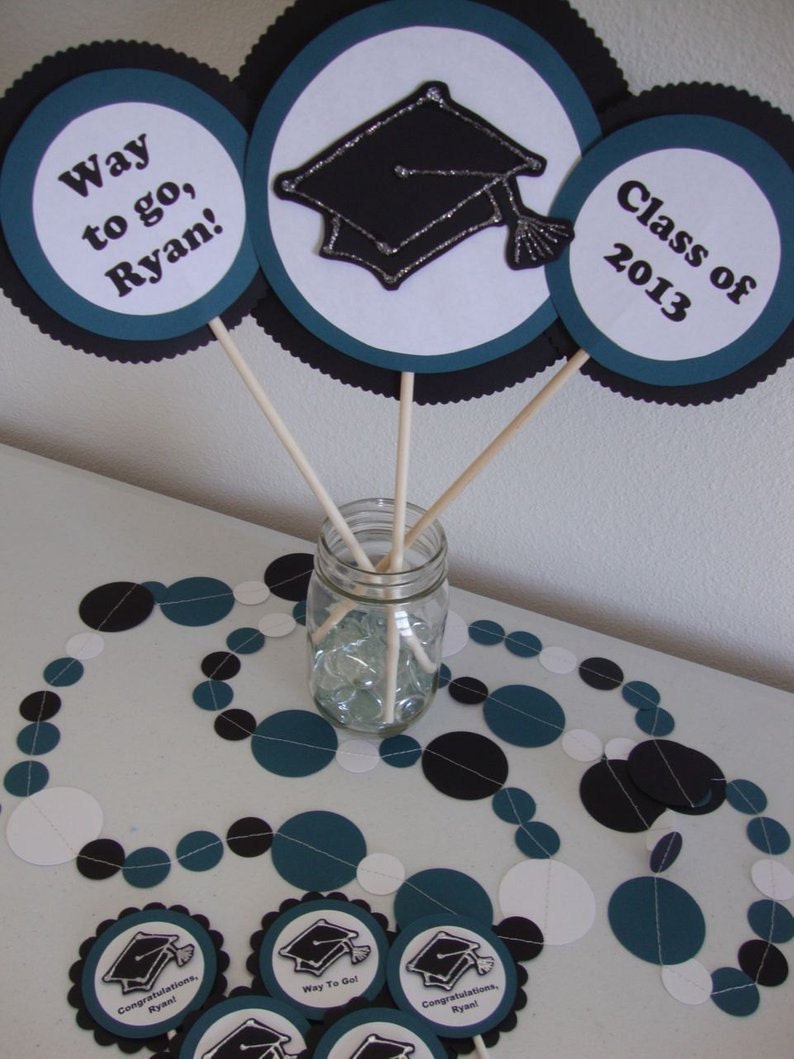 Teal and black graduation centerpiece, garland and cupcake toppers