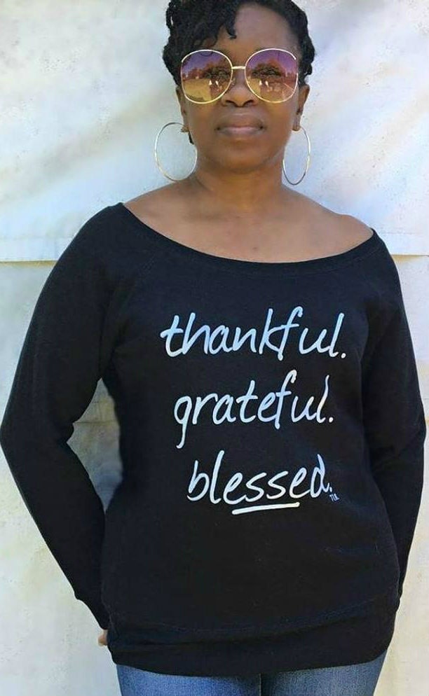 Me, rocking our Thankful, Grateful, Blessed off shoulder sweatshirt