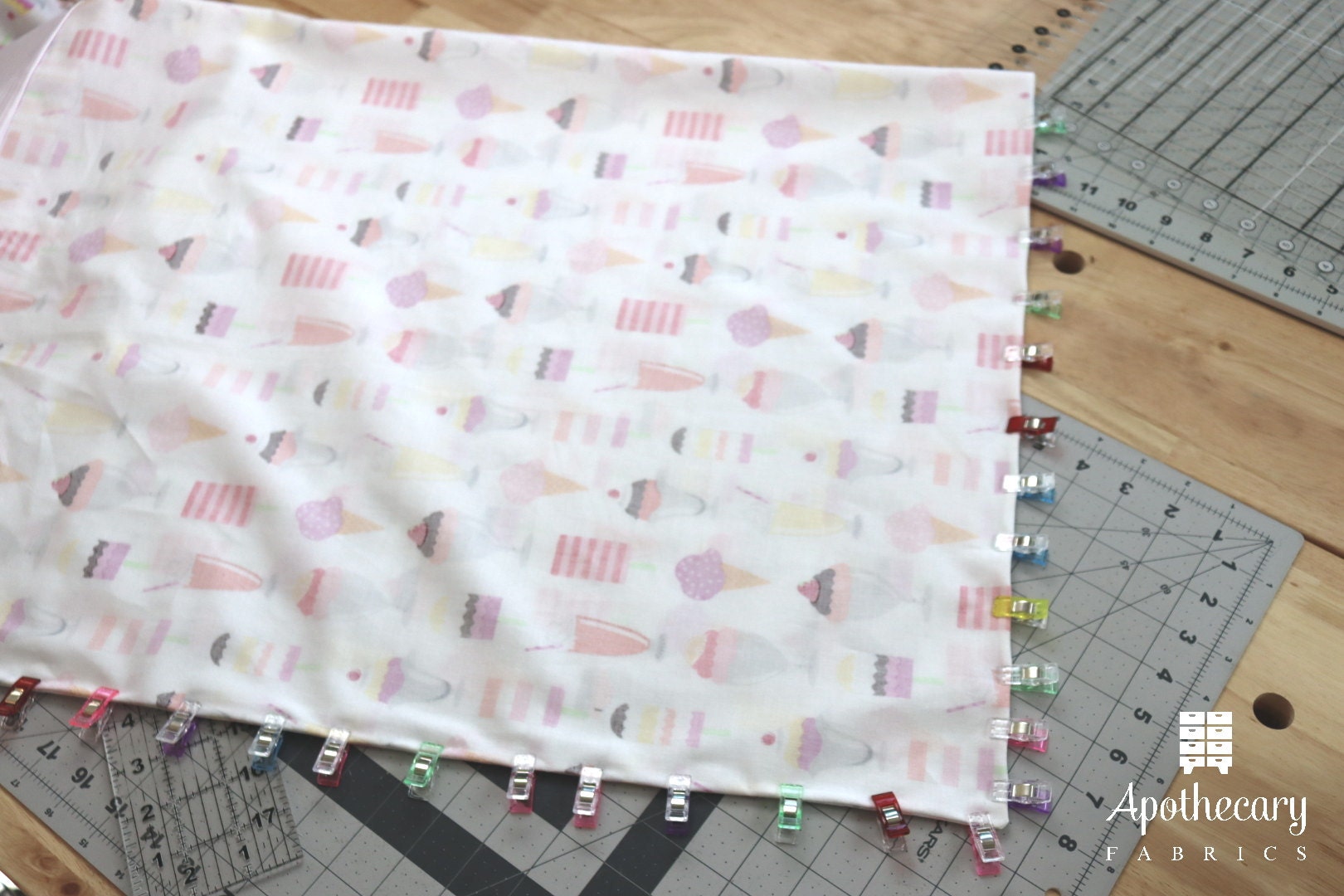 Edges lined up and clipped to ensure a clean stitch line.