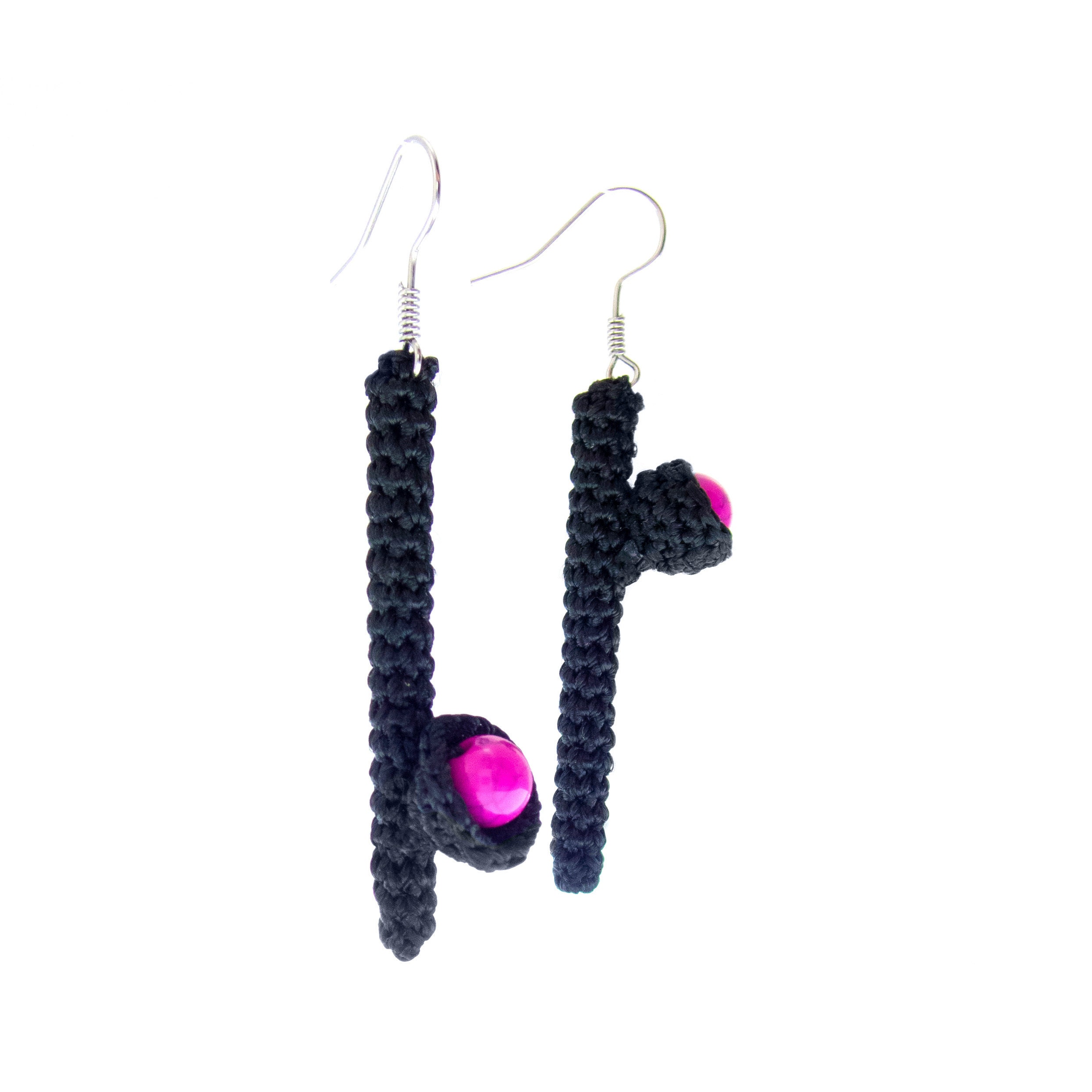 handmade mismatched earrings dangle in black and pink