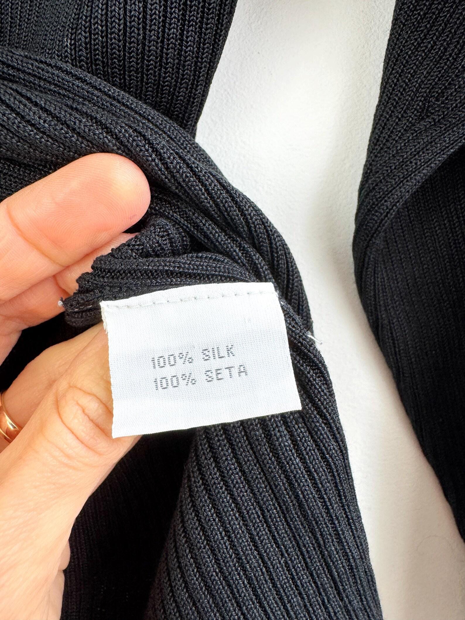 Label of 100% silk cardigan