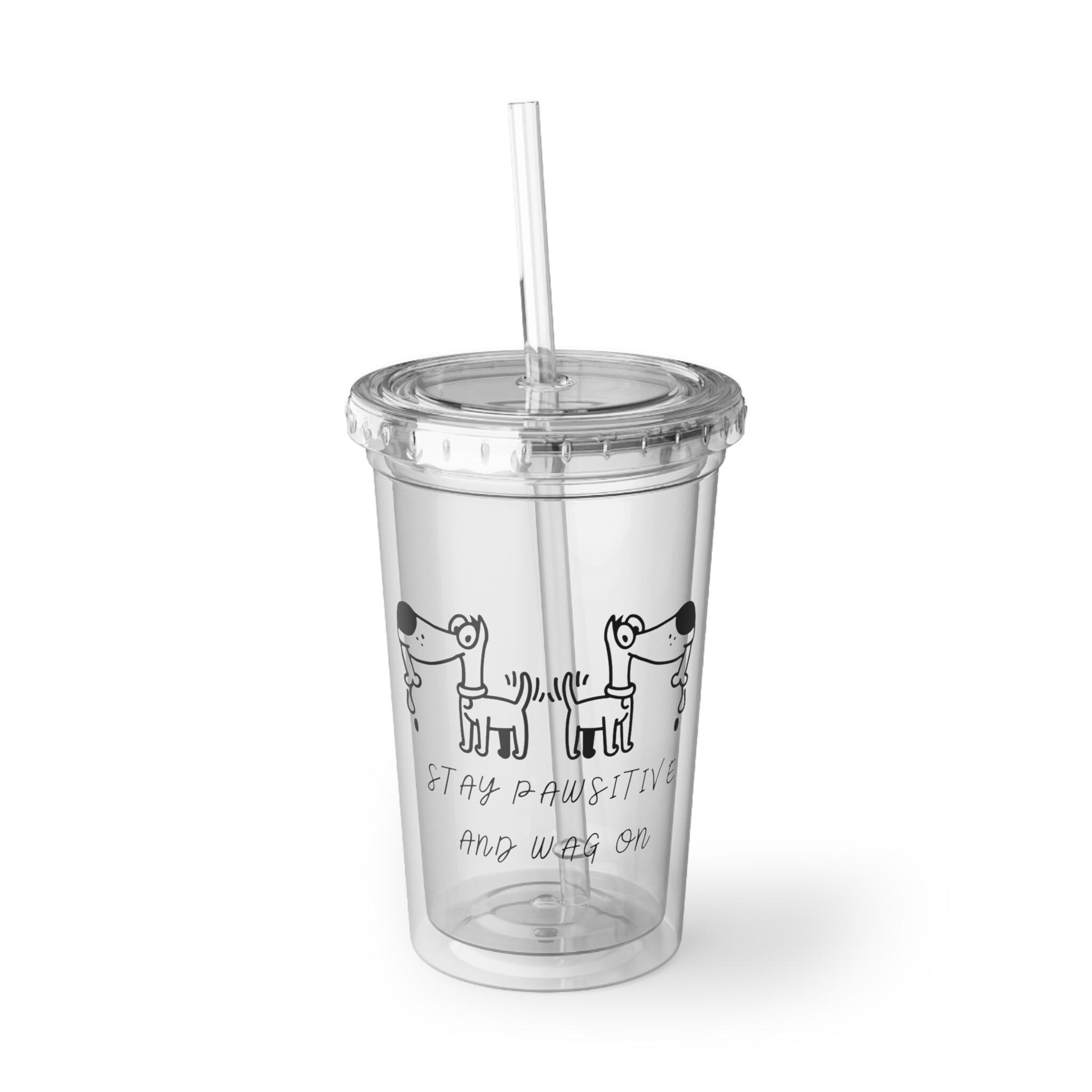 A clear plastic drinking glass with motivational quote