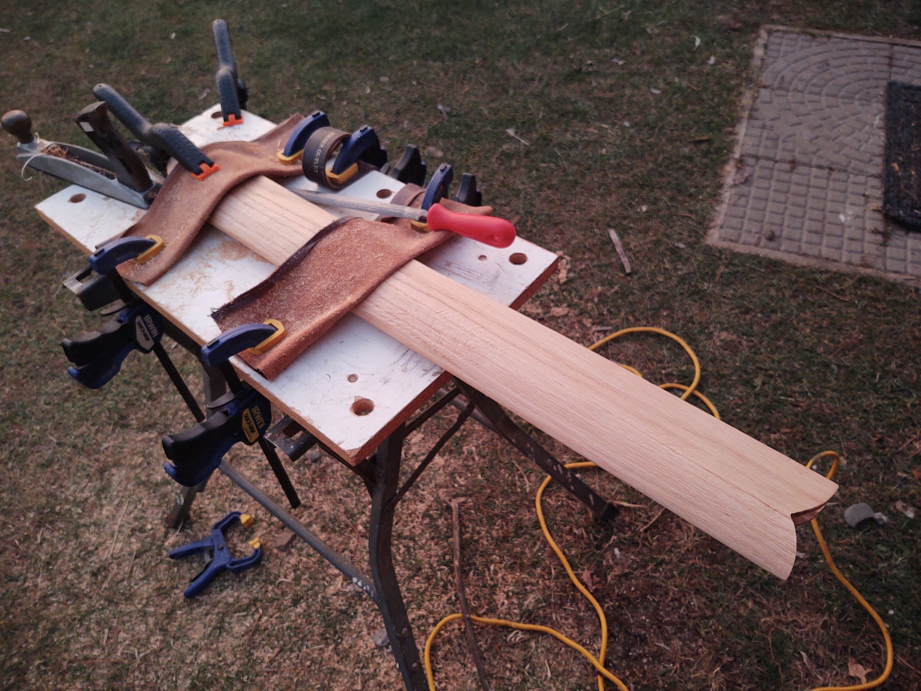 carefully hand planning the scabbard