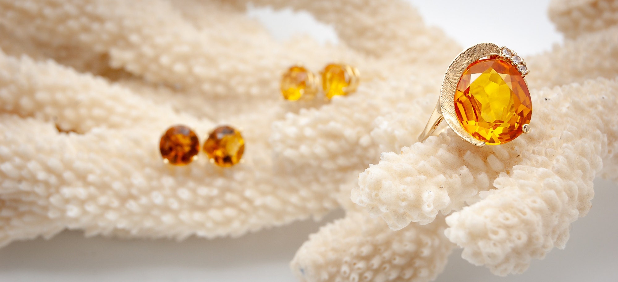 Citrine-Gold-Deco-Ring-Earrings-on-Coral