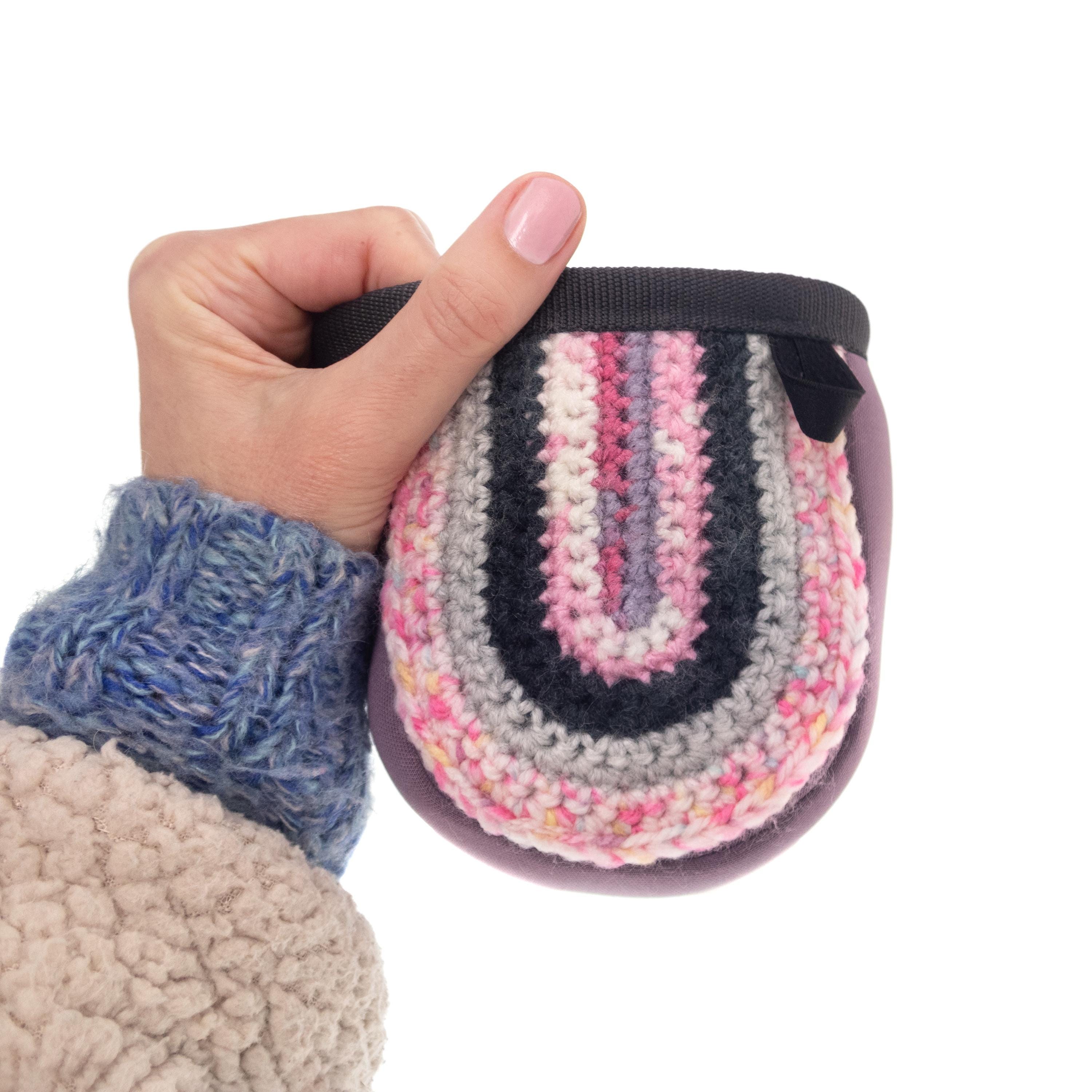 Handmade pink climbing accessory for kids, crafted as a durable chalk pouch for climbing practice.