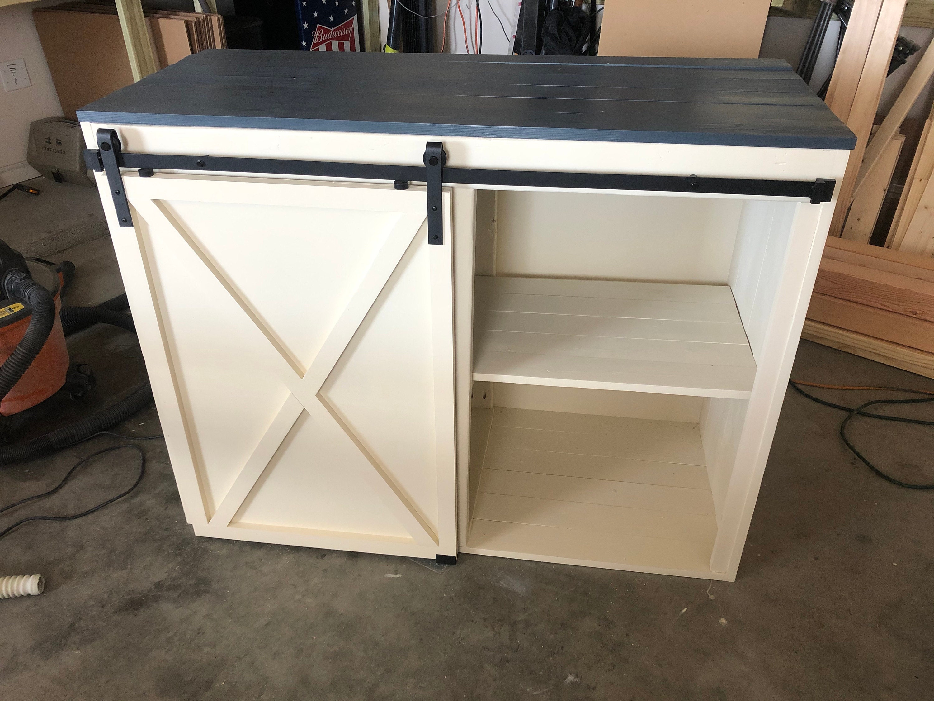 With shelves on the opposite side. With this build I had no plans and designed it as I went. Turned out amazing! She absolutely loved it.