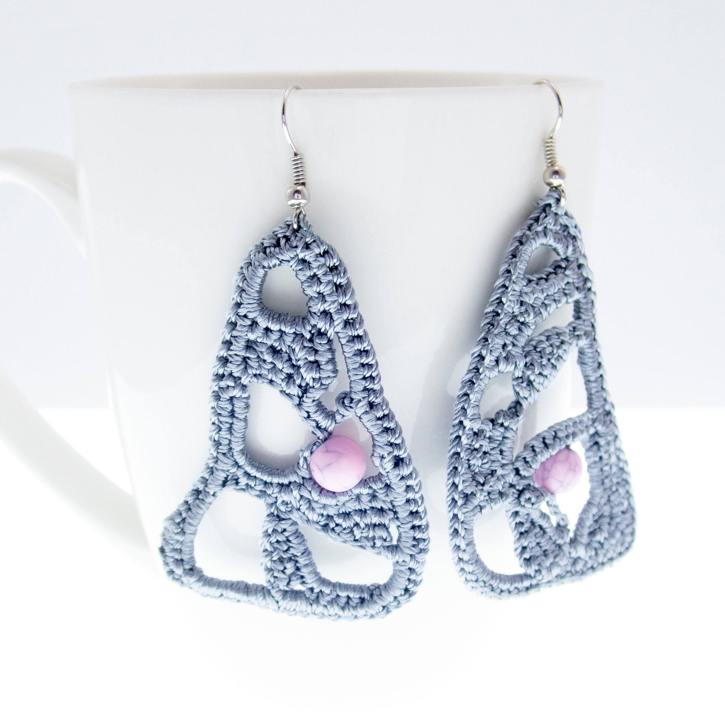 handmade lace earrings for a wedding with grey freeform triangles and pale pink bead