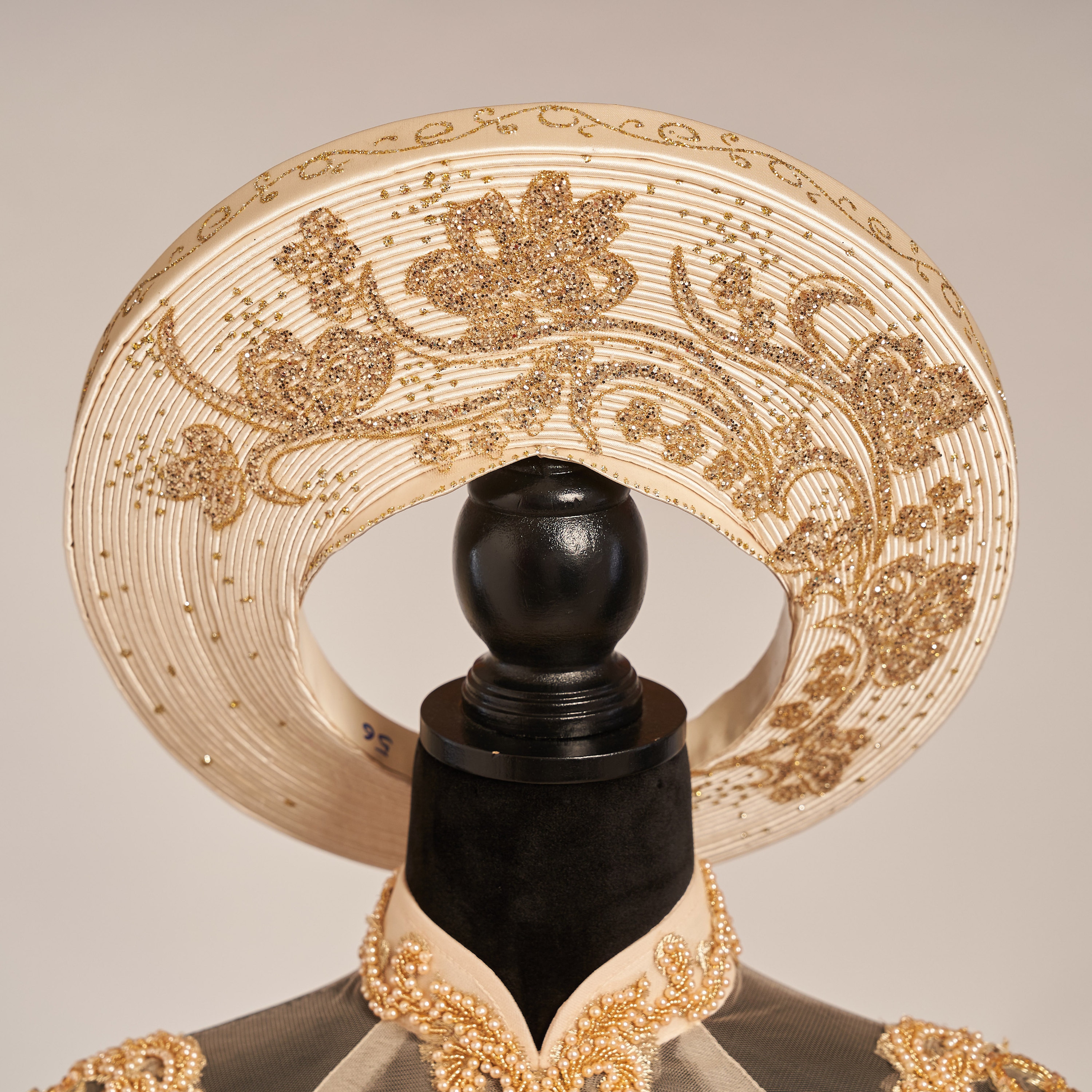 An elaborate headpiece with gold details