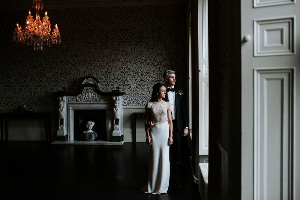 Photo of the bride and groom with contrasting background colours and shadows