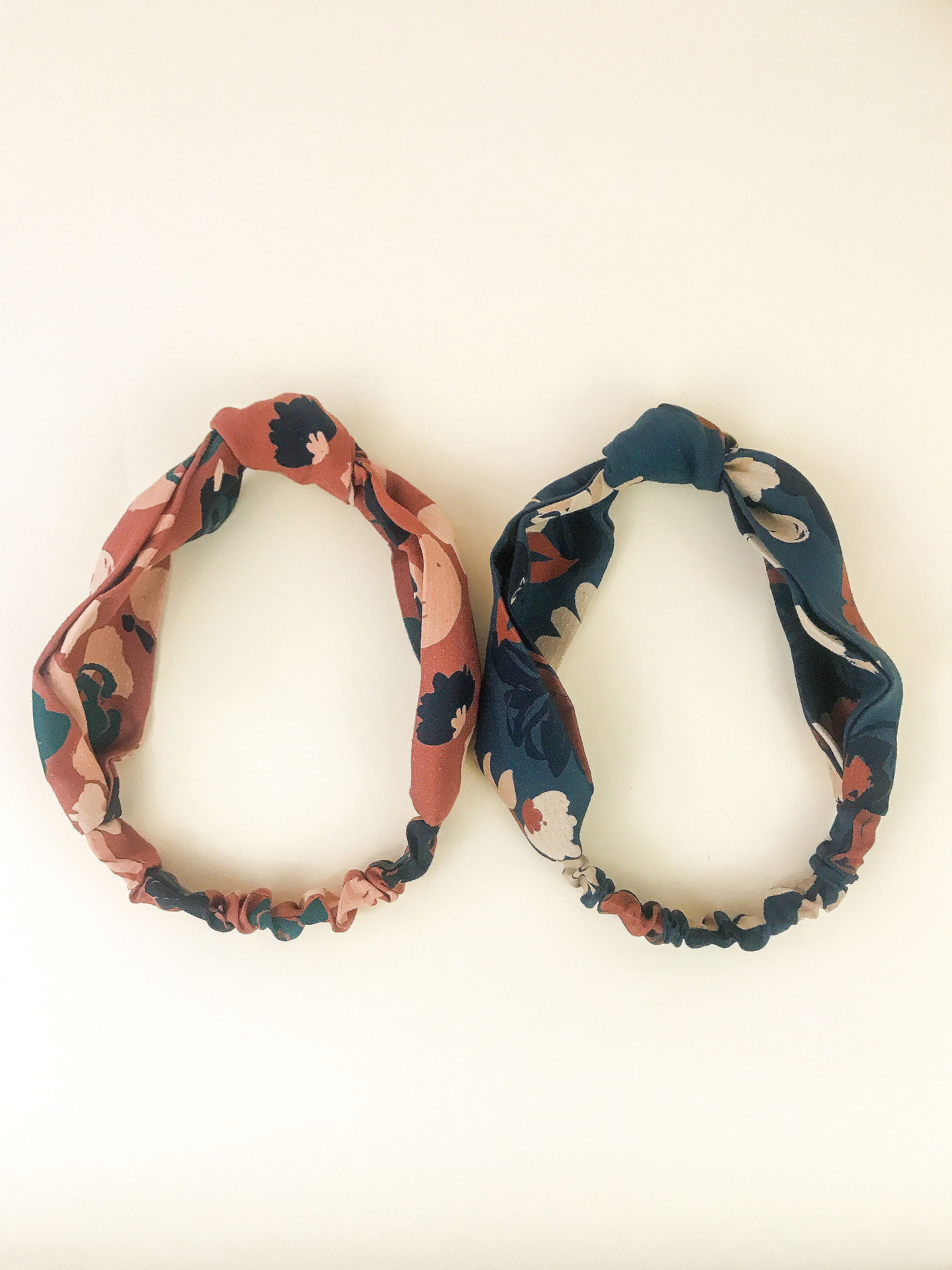 Brown and gray floral knotted headbands.