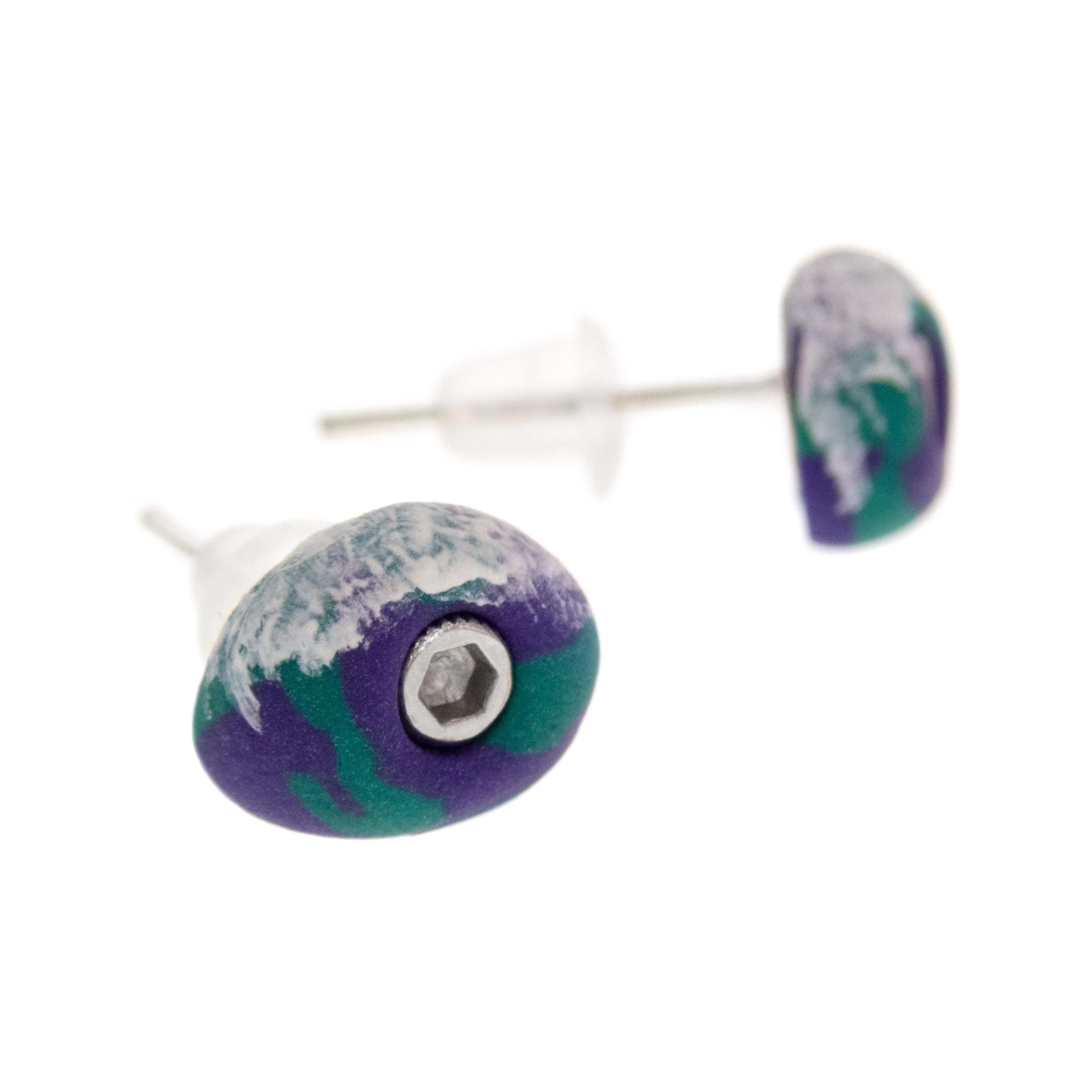 Lightweight polymer clay earrings shaped like rock climbing holds
