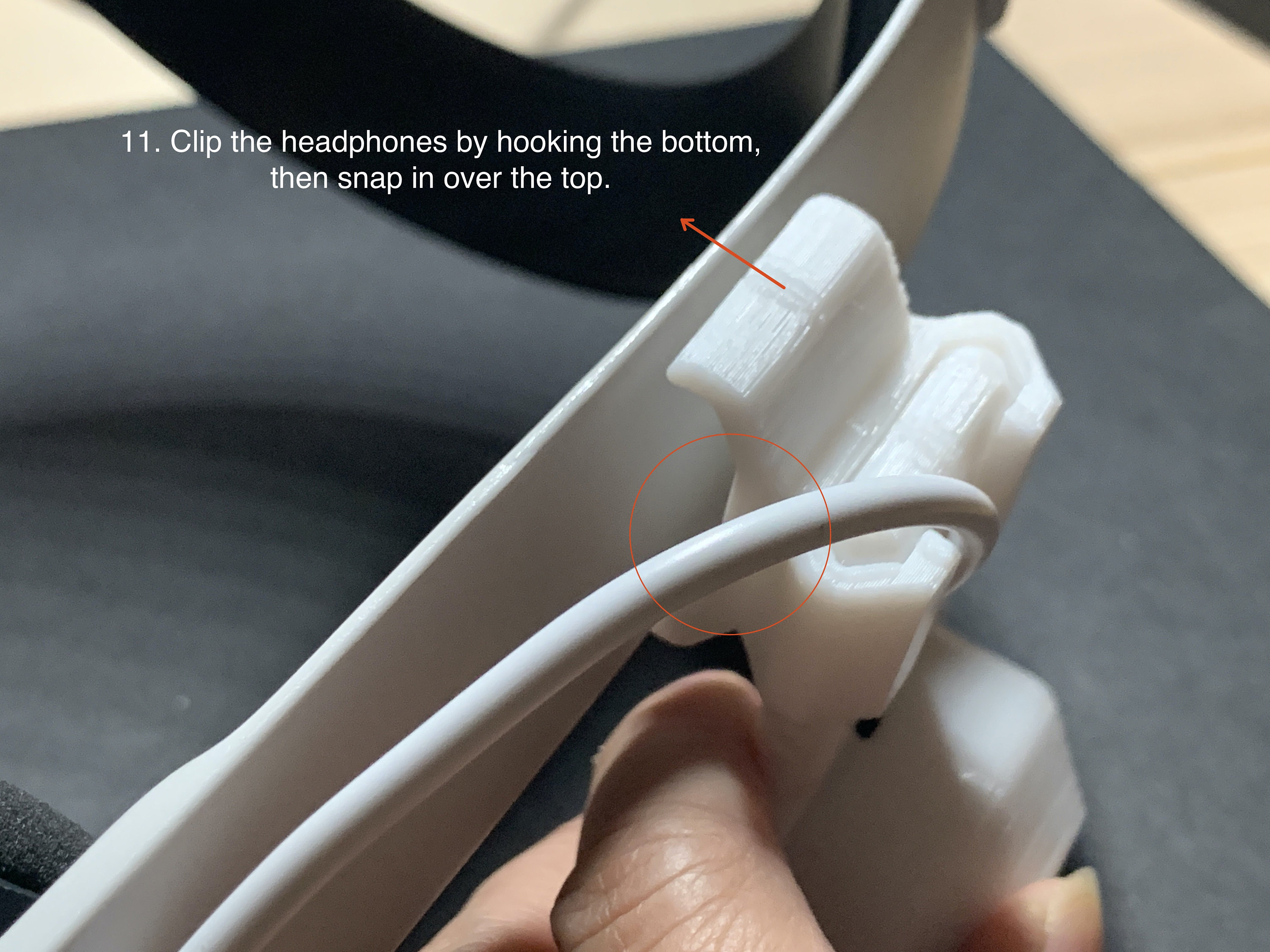 11. Clip the headphones by hooking the bottom, then snap in over the top.