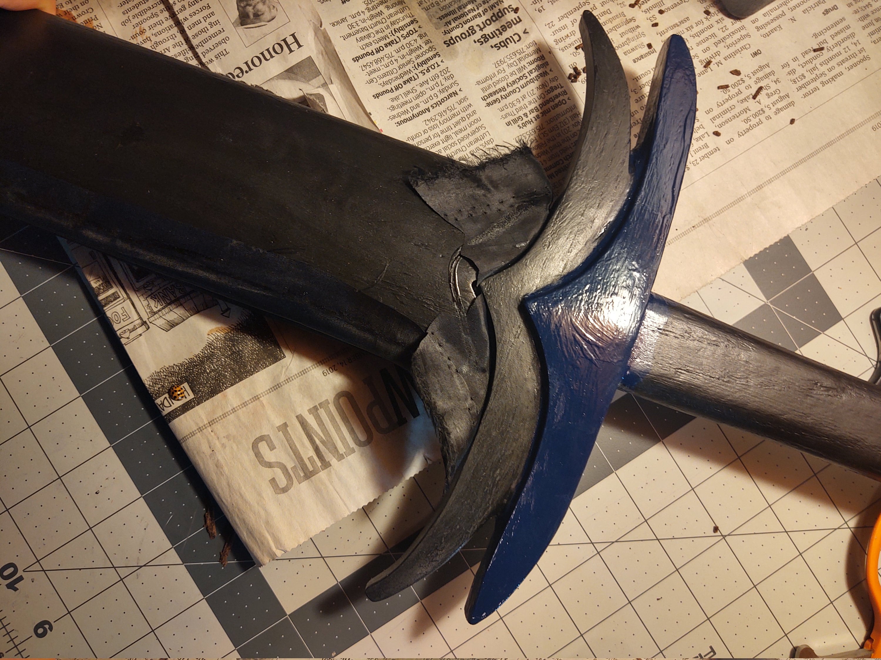 inserting the satin lining to protect the blade