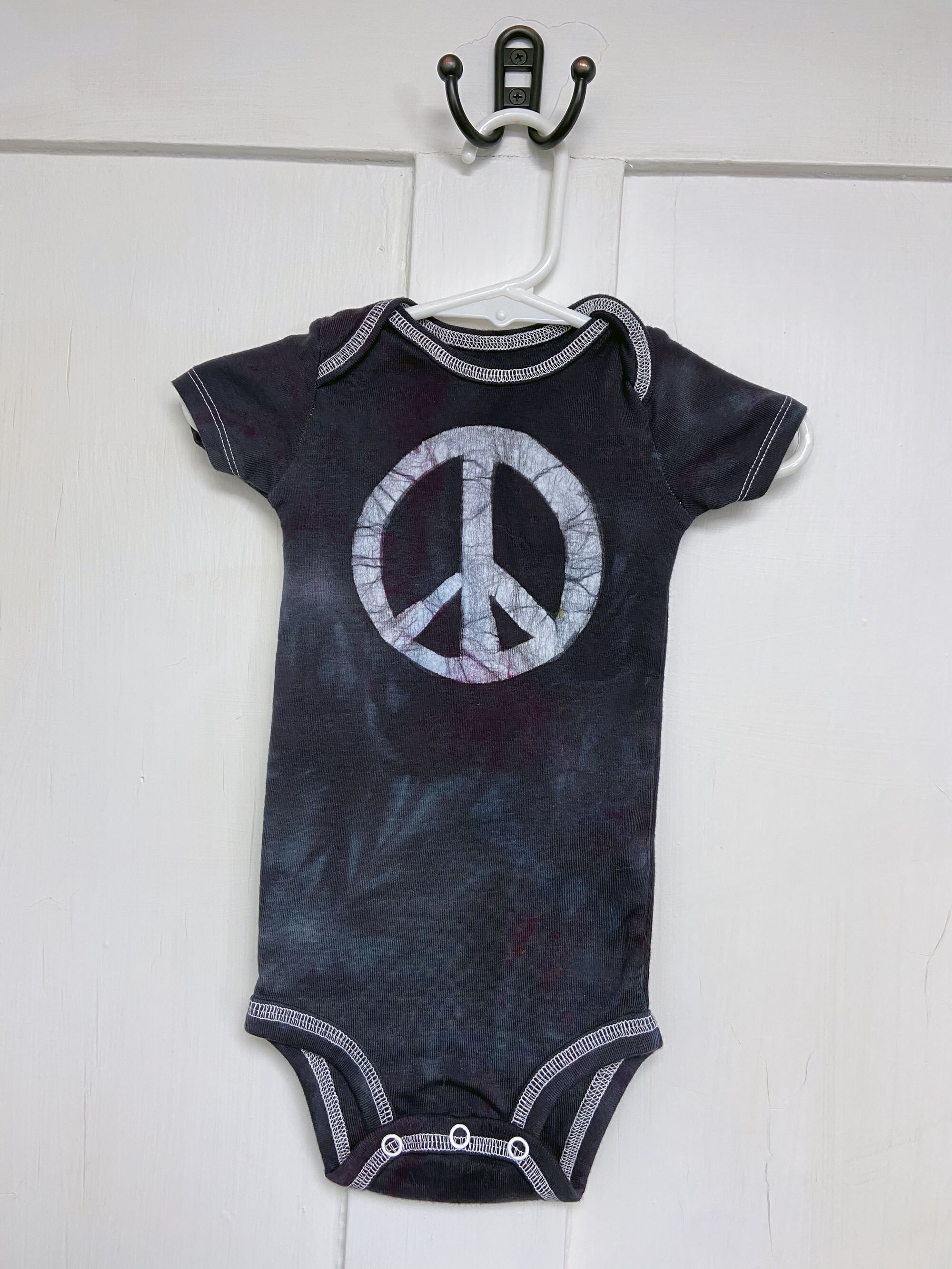 12 month peace sign bodysuit by Peace, Baby! Batiks