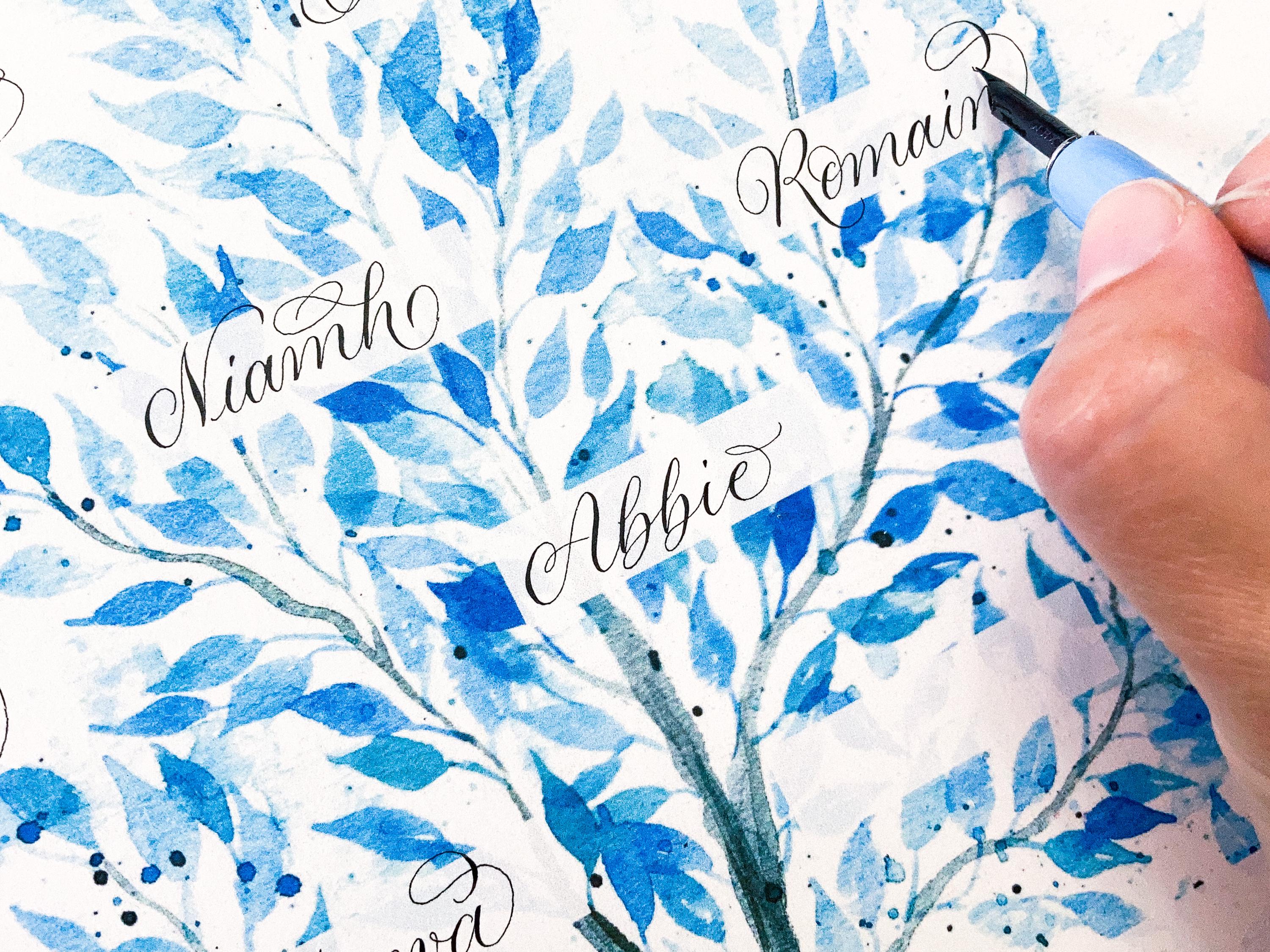Adding calligraphy by hand to a painterly blue family tree